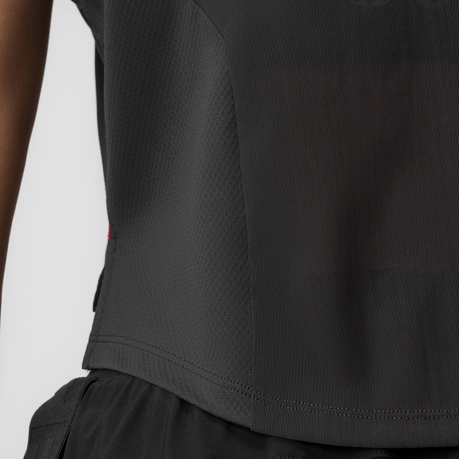 Black AeroSilver cropped training tee on model, side detail view