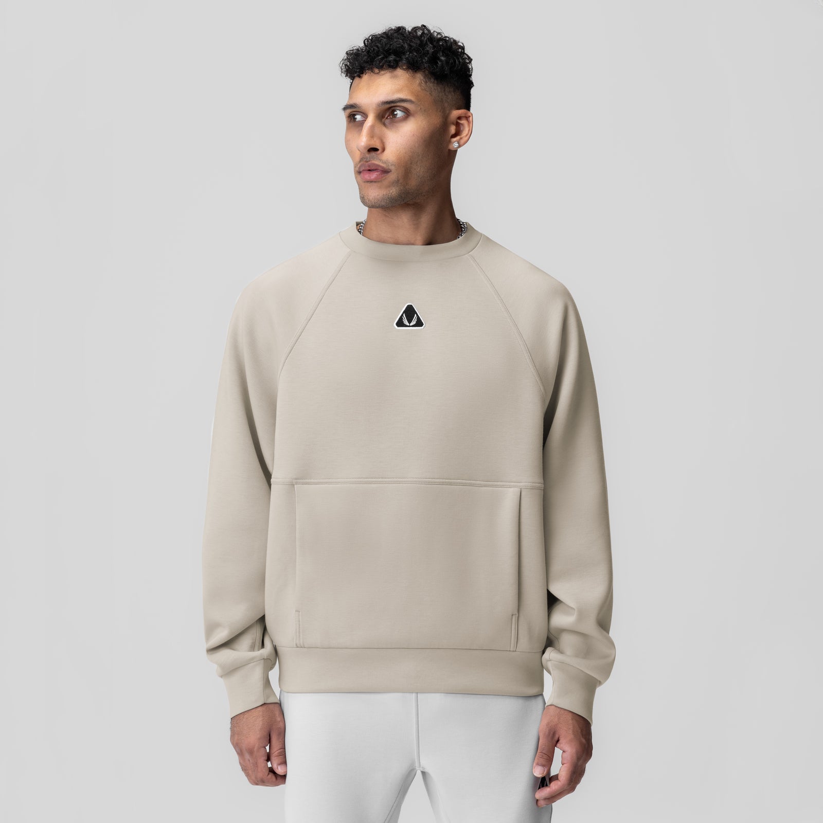 1020. Dri-Core™ Oversized Crewneck in chai, worn by model, front view