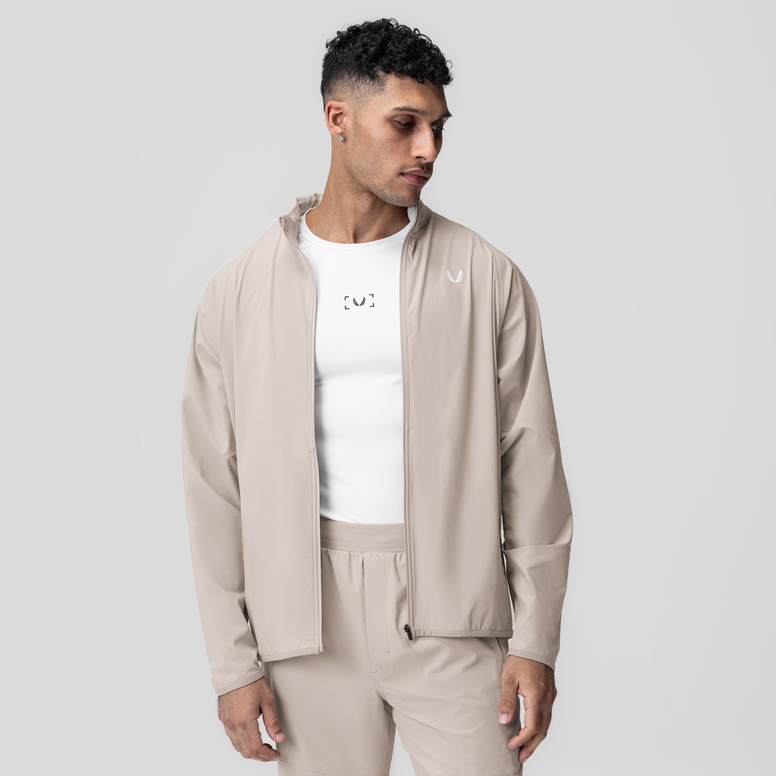 Aerotex Weather-Ready Bonded Windbreaker in Chai, worn by model with white tee, front view