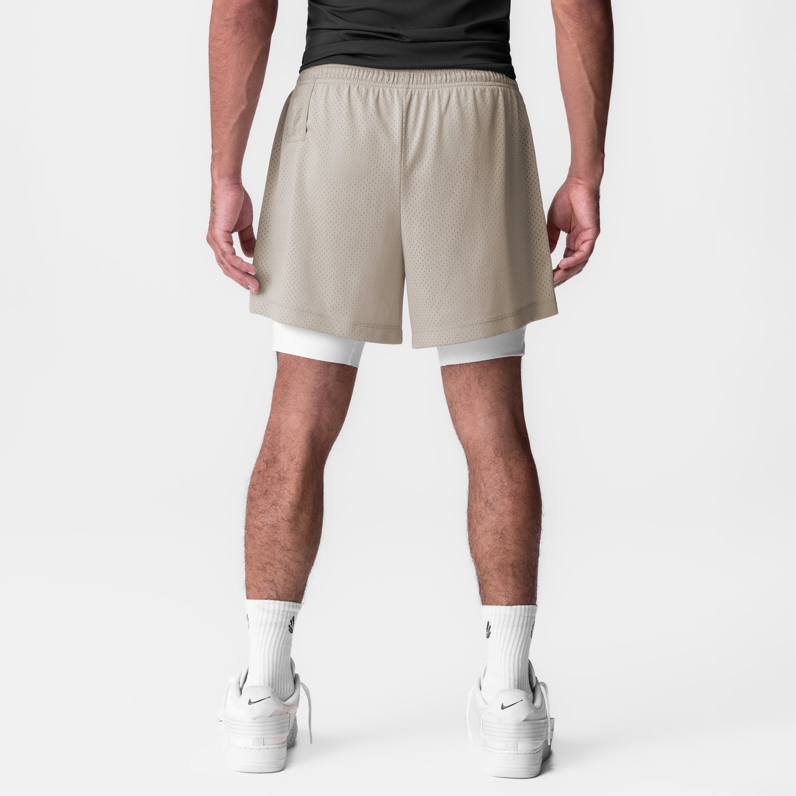 Ion-Mesh 5" Liner Short in Chai, back view on model with white socks and sneakers