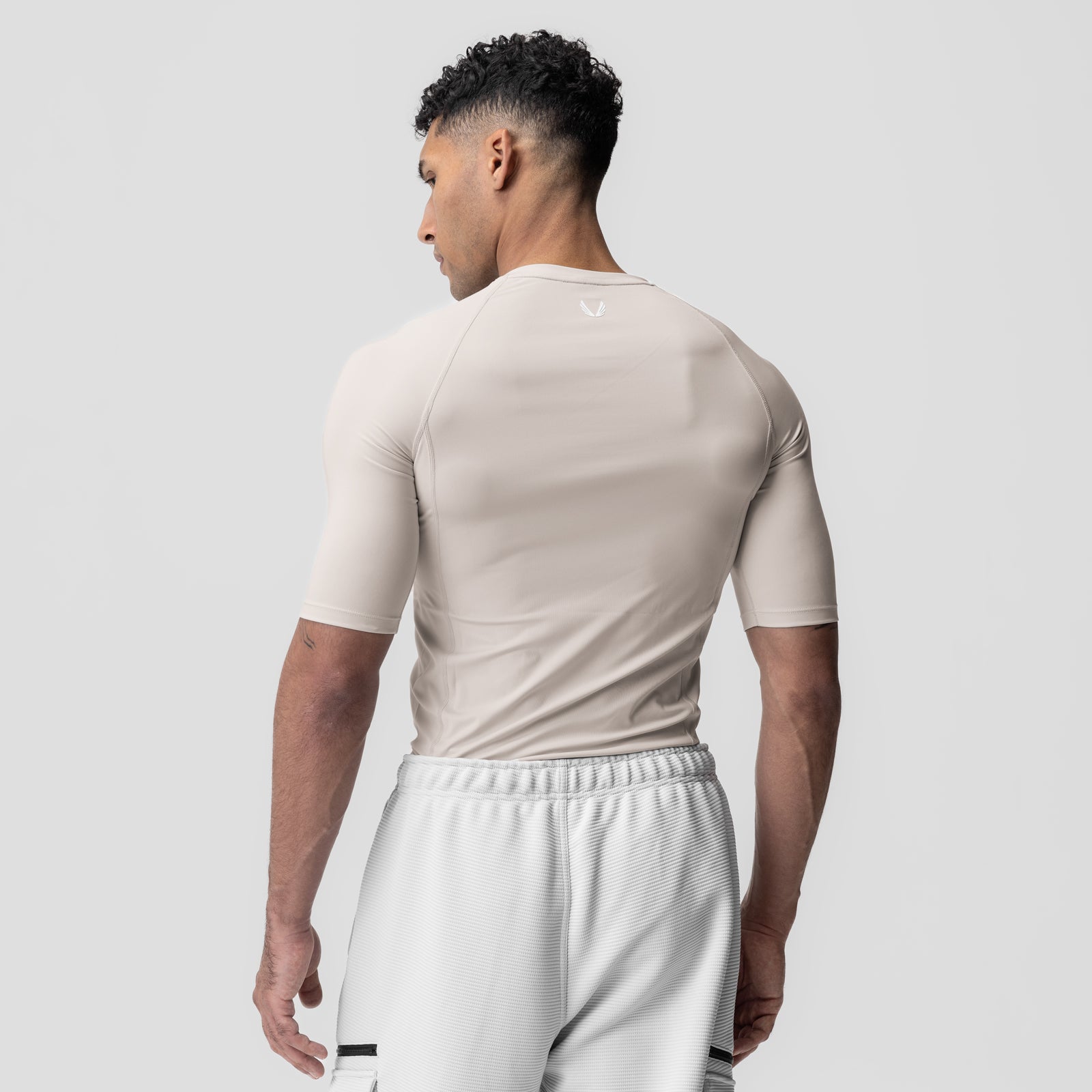 WarpFlexx-Lite Half-Sleeve Baselayer in Chai, worn by model, back view