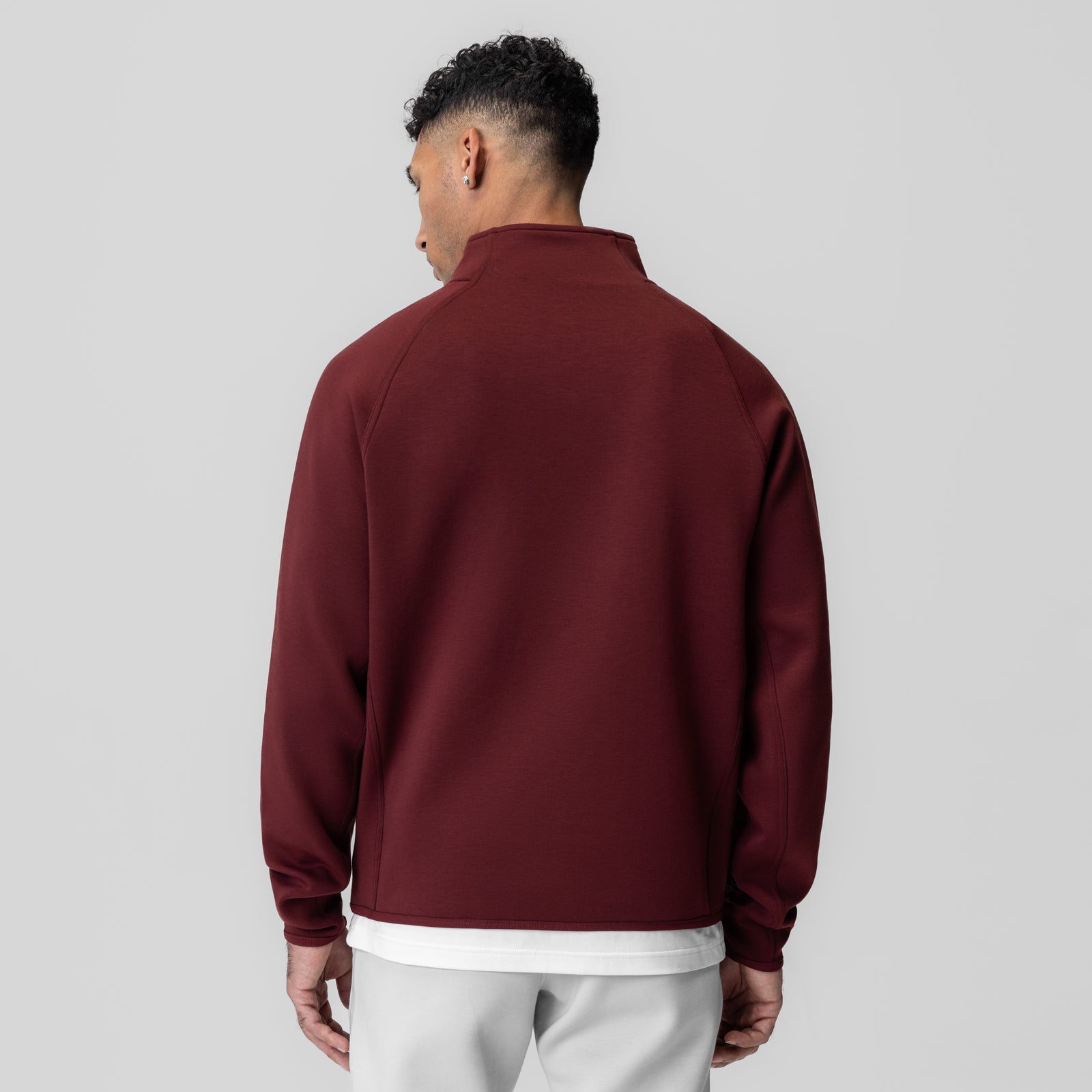 Dri-Core Quarter Zip in crimson, back view worn by model