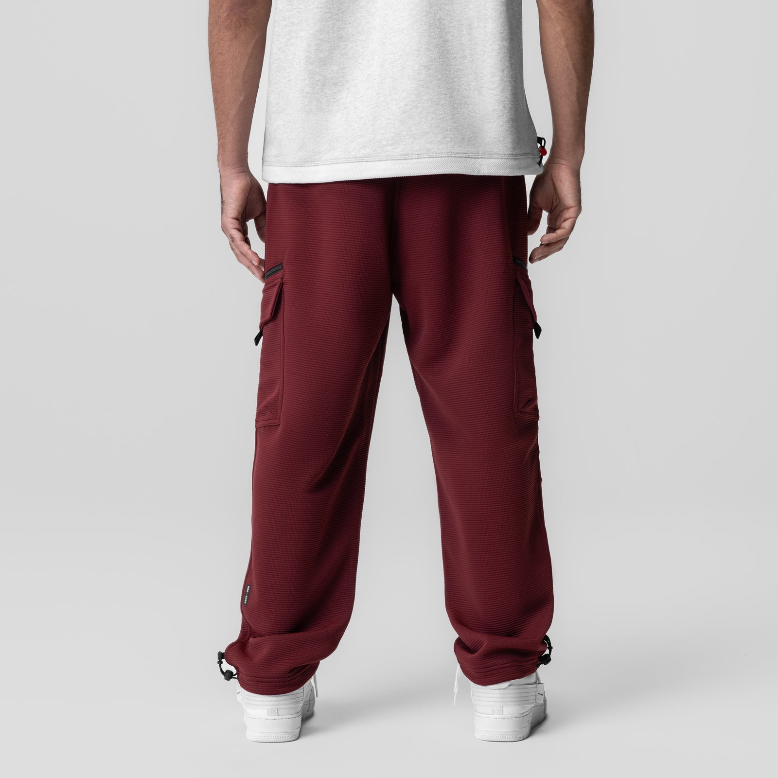 Deltapeak® Cargo Cinch Jogger in crimson, back view on model