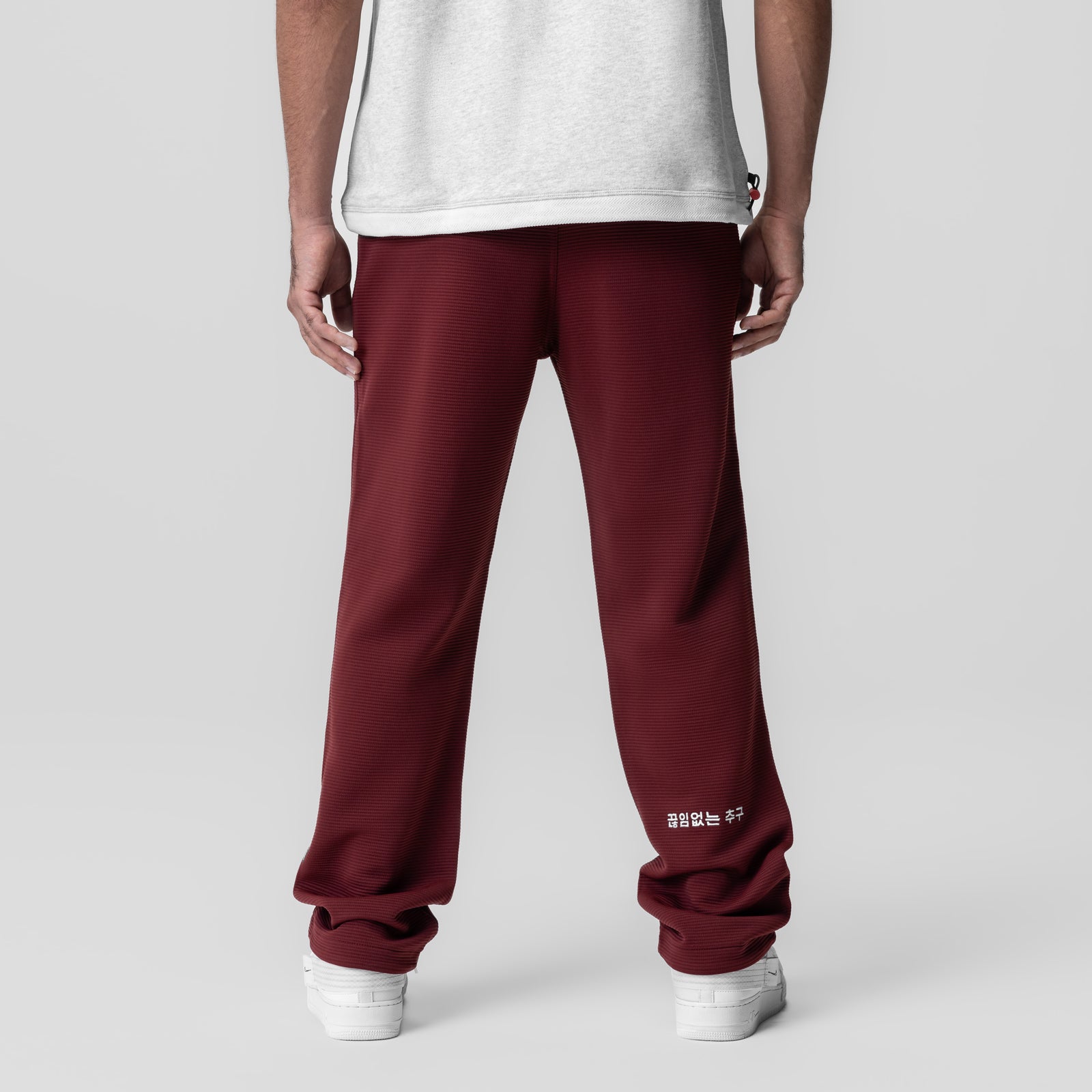Deltapeak® Straight Leg Sweats in crimson, back view on model