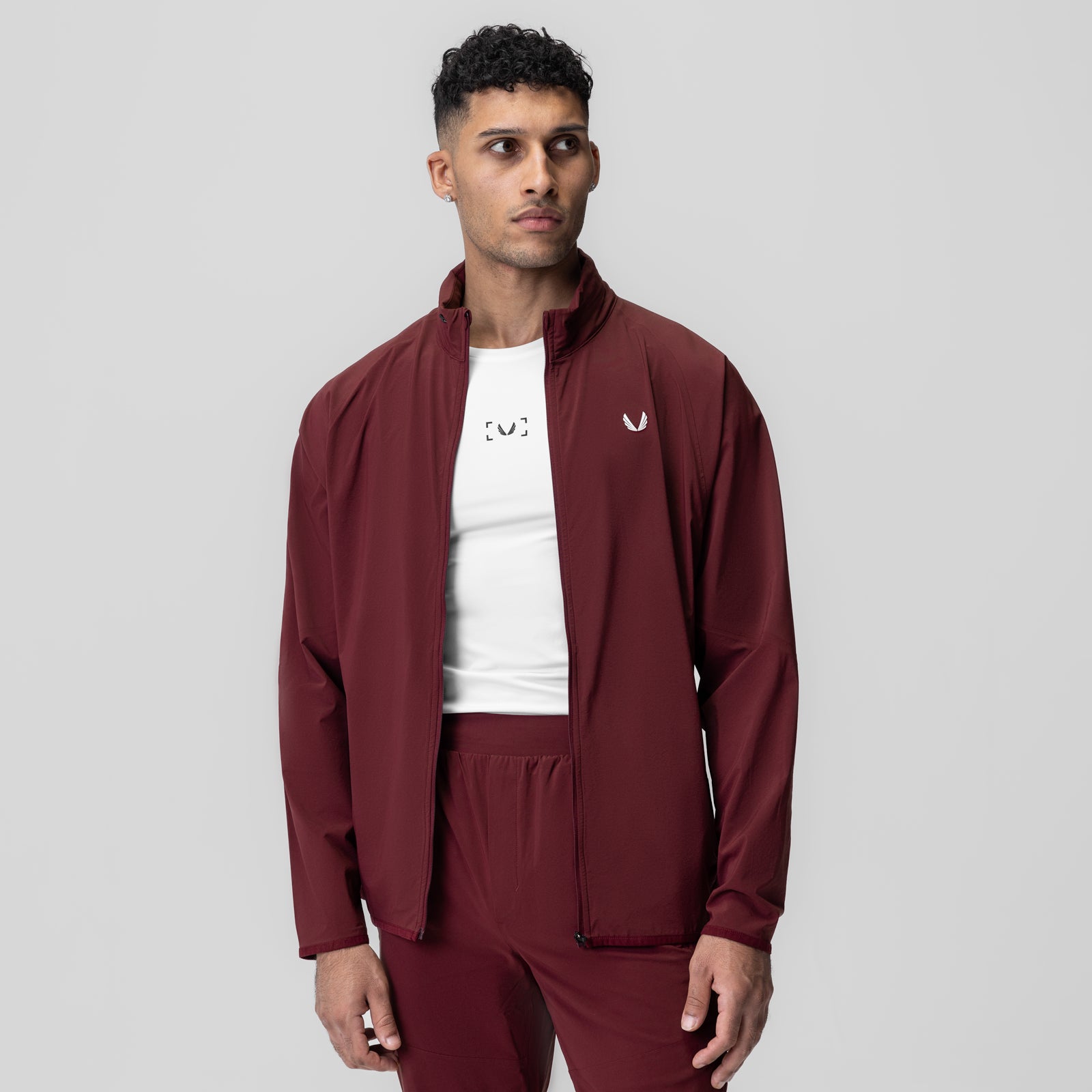 Aerotex Weather-Ready Bonded Windbreaker in crimson, worn by model with white t-shirt underneath, front view