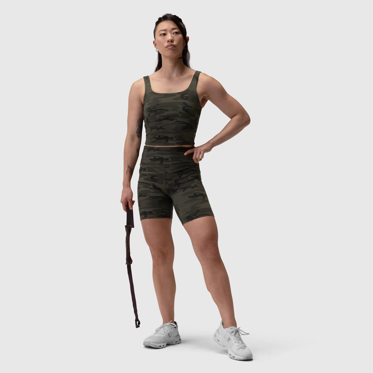 LYCRA® 3-in-1 Biker Short in Dark Camo, model wearing matching crop top and shorts
