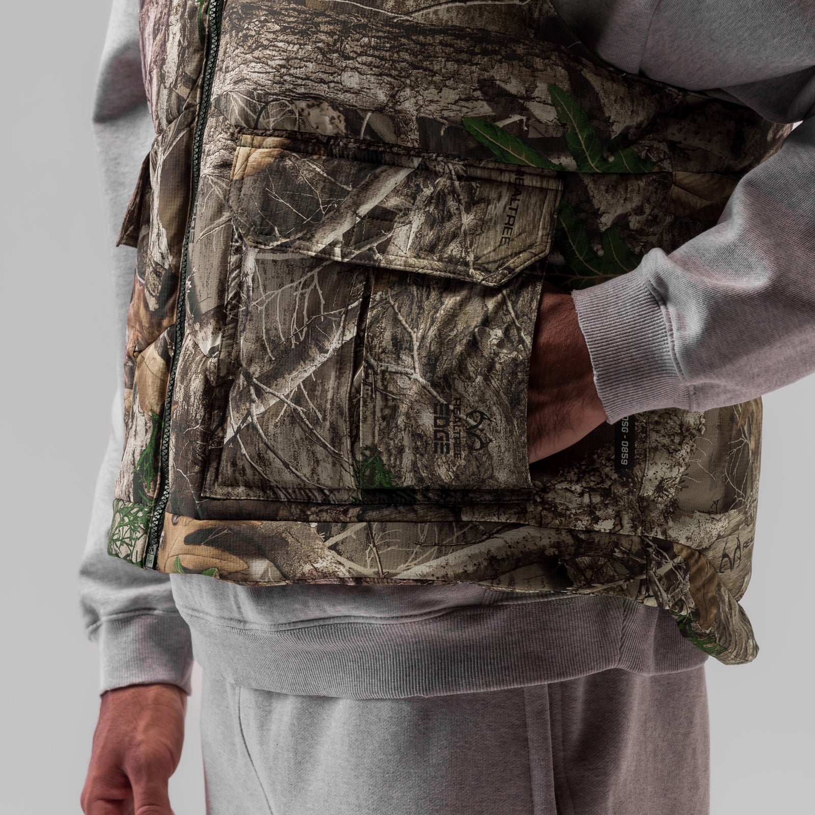 Ripstop Insulated Puffer Gilet in Realtree camo, worn by model, front view detail