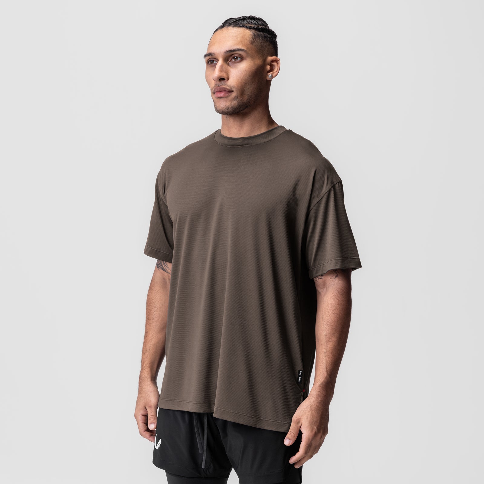 AeroSilver® Oversized Tee in Deep Taupe, worn by model in three-quarter front view