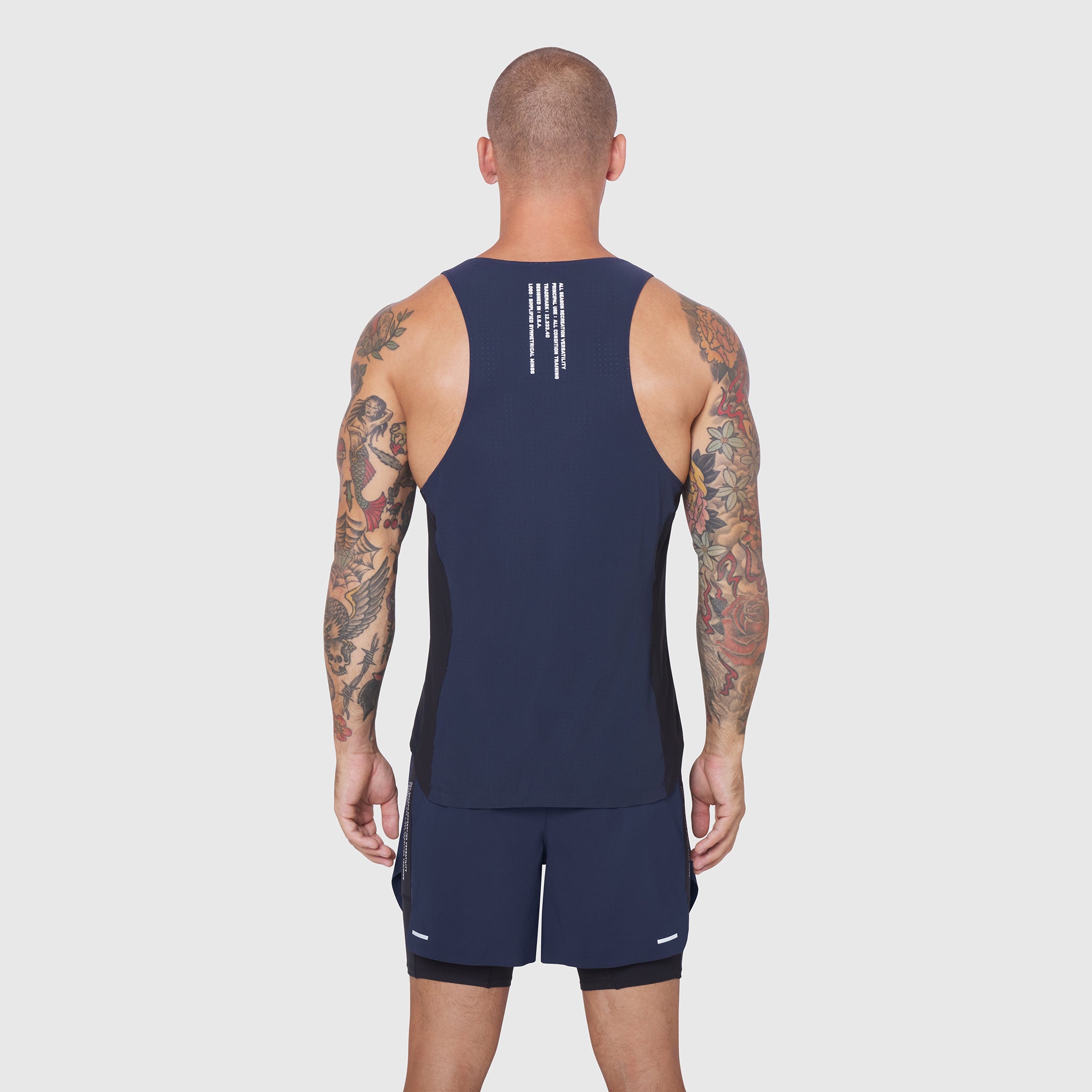 Laser-Vent™ Singlet Tank in Navy/Black, back view on model