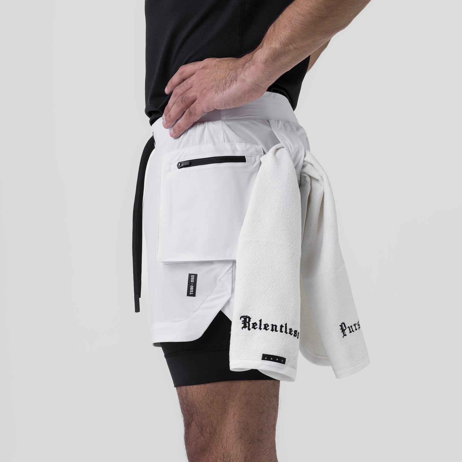 Tetra-Lite Cargo Short in white worn by model, side view showing pockets
