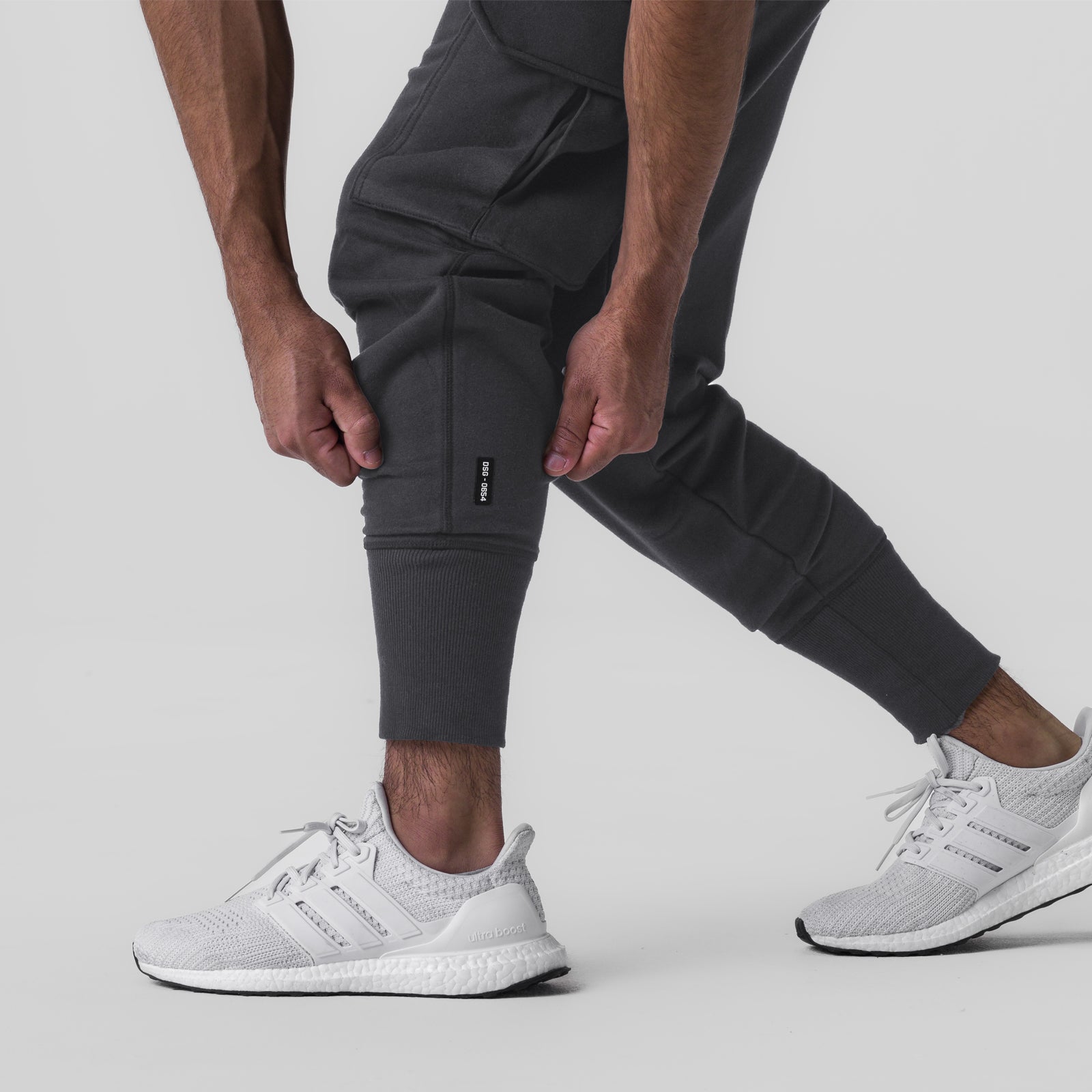 Tech-Terry Cargo High Rib Jogger in Dusk Black, worn with white sneakers, front view