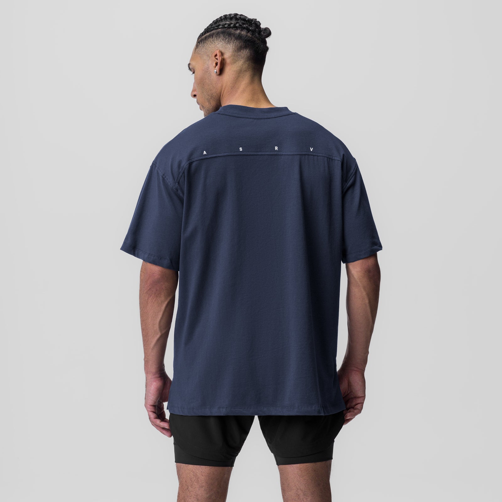 Supima® Oversized Tee in navy, back view on model with black shorts