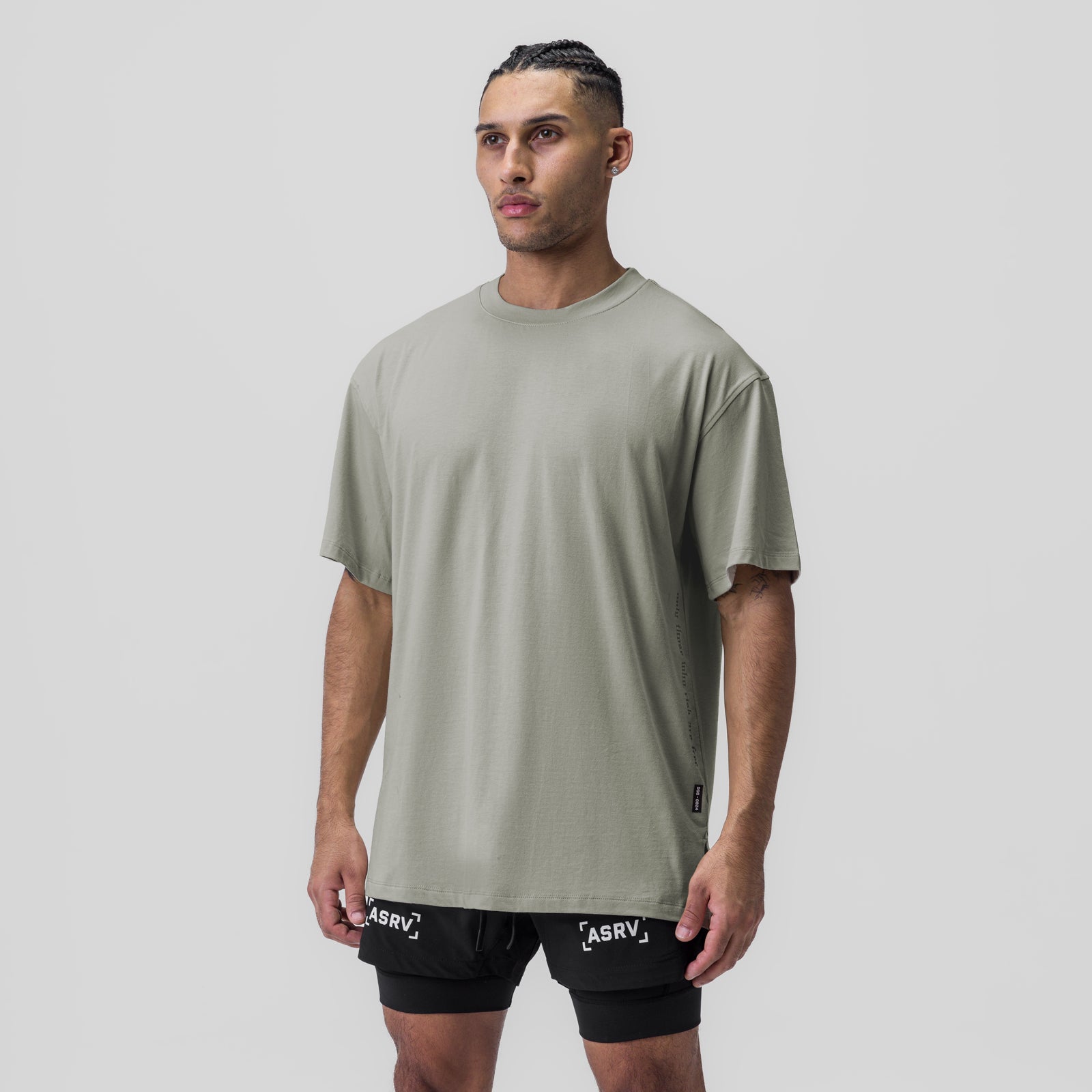 Supima® Oversized Tee in sage worn by model with black shorts, front view