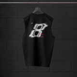 Black Tech Essential Relaxed Cutoff sleeveless tank with 'Infinite Mindset' graphic, back view on hanger