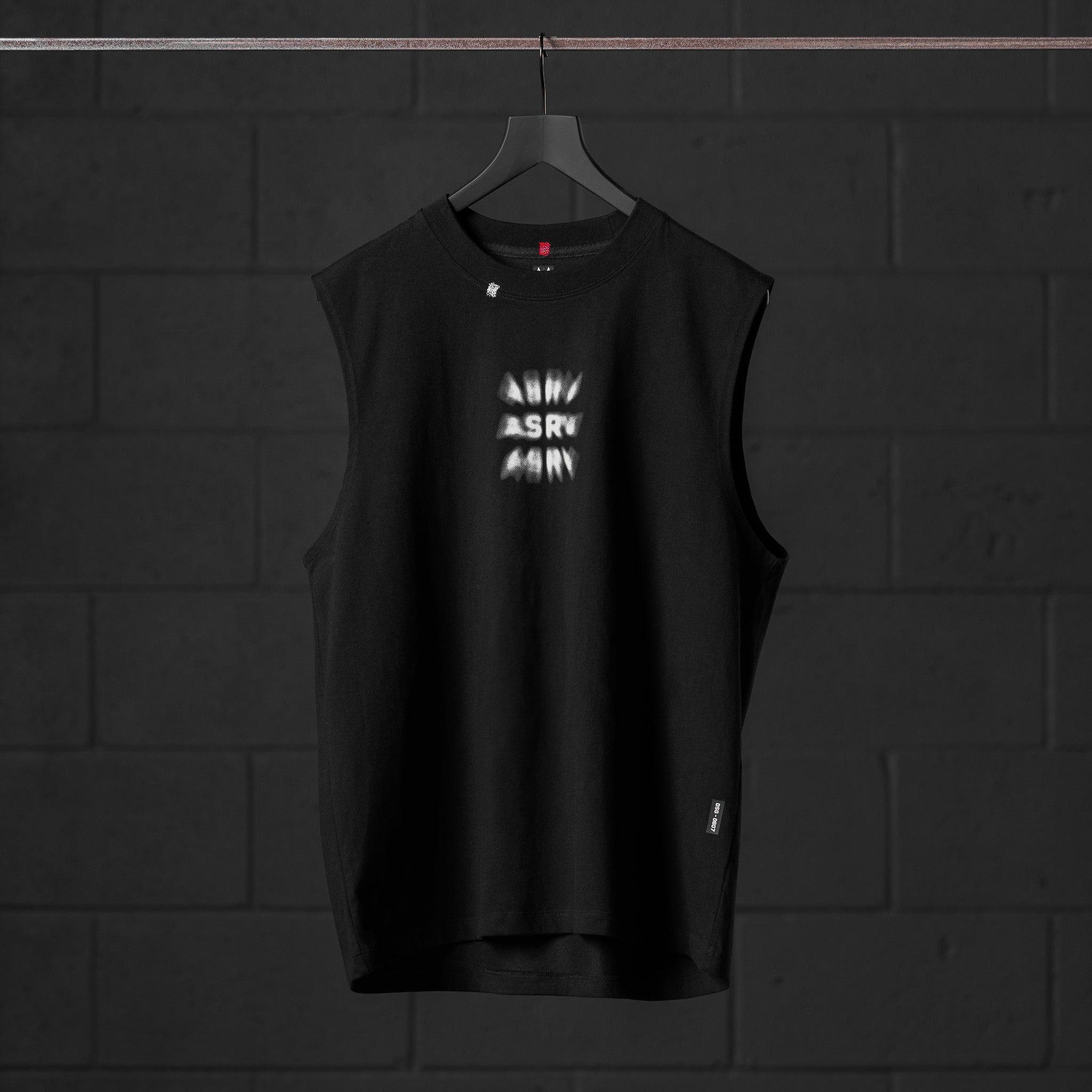 Black Tech Essential Relaxed Cutoff sleeveless tee on hanger, front view