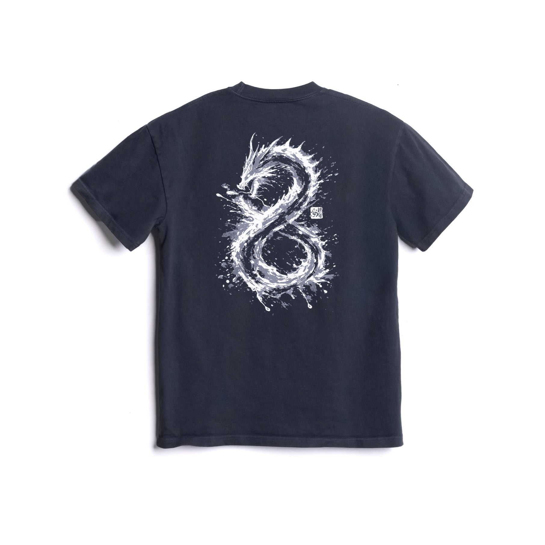Flatlay of navy cotton tee with white dragon graphic design on back, shot from above