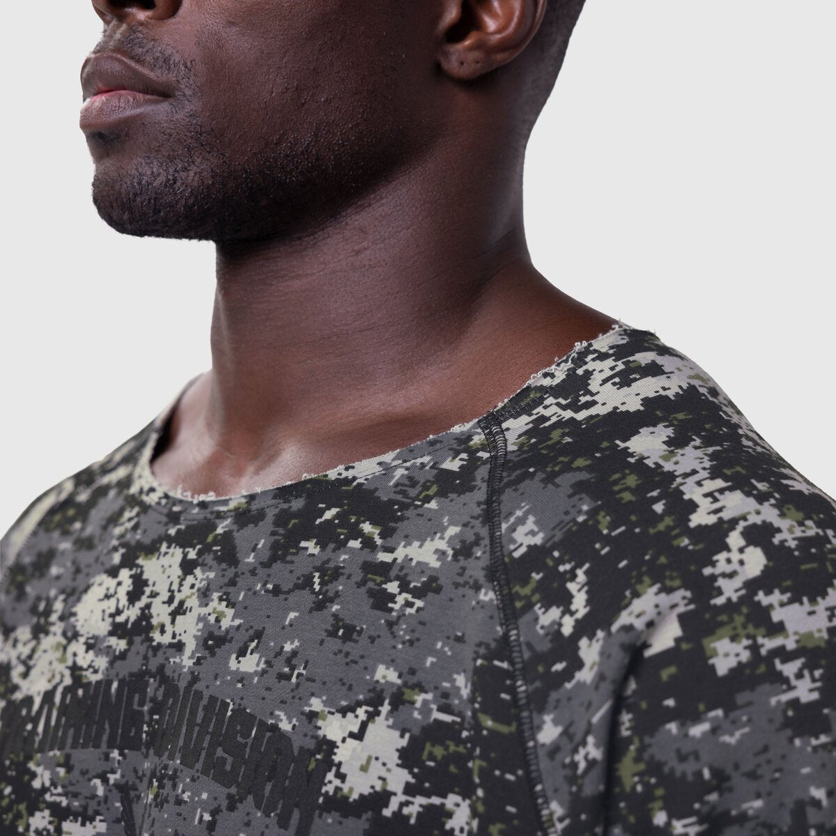 Vintage Raw Hem Pump Cover in pixel camo worn by model, side view
