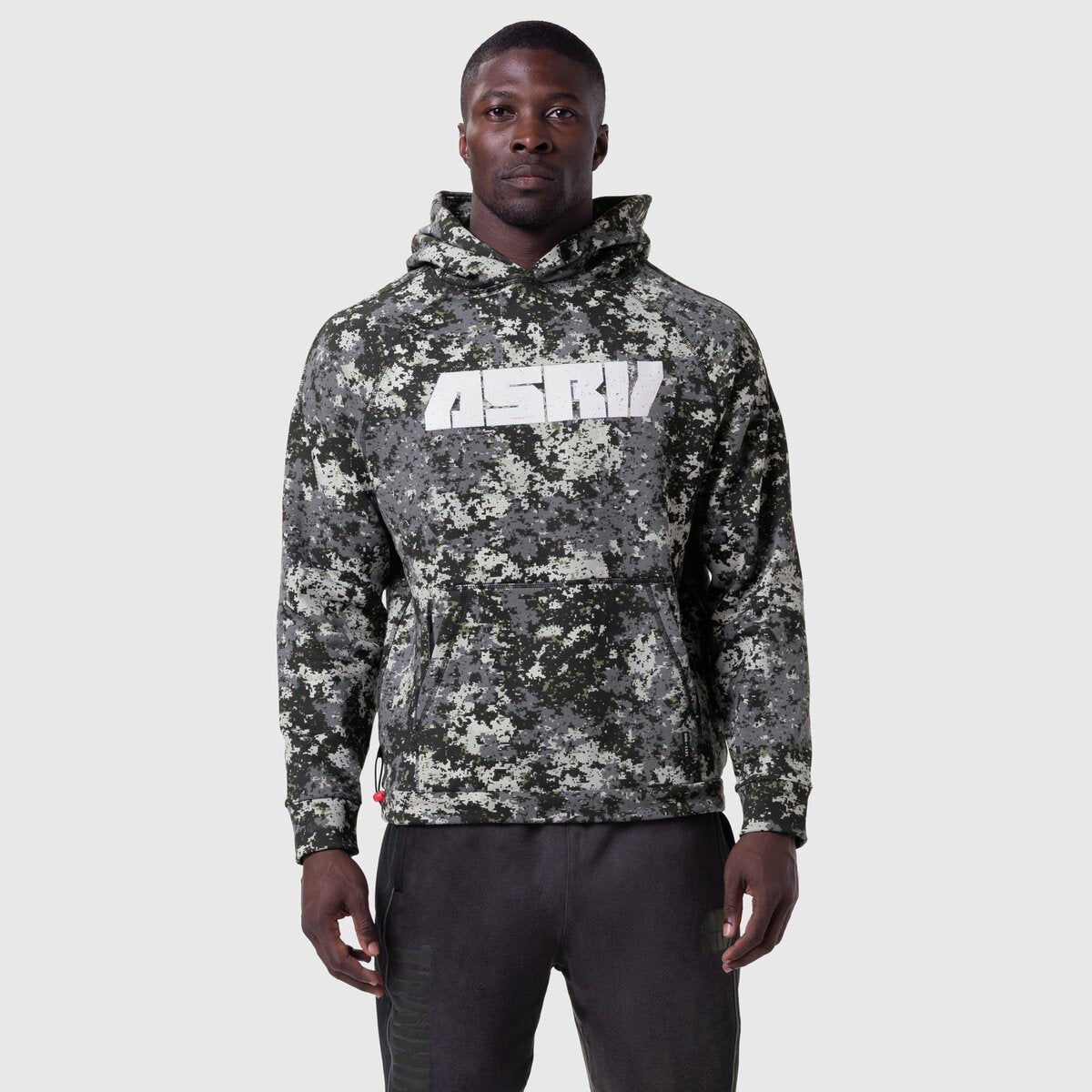 1121. Tech-Terry™ Training Hoodie in Pixel Camo Blade worn by model, front view