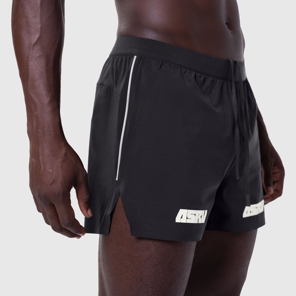 Aerotex™ 3" Distance Short in black, worn by model, side view
