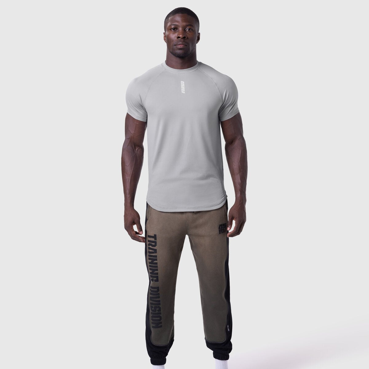 AeroSilver Established Tee in slate grey worn with brown joggers, front view on model