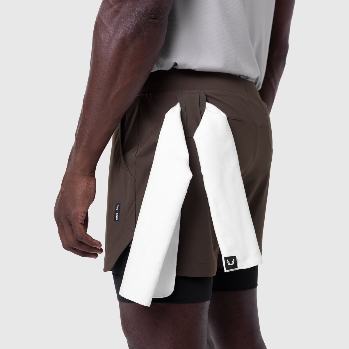 Tetra-Lite 5" Liner Short in Dark Earth with white wings detail, worn by model, side view