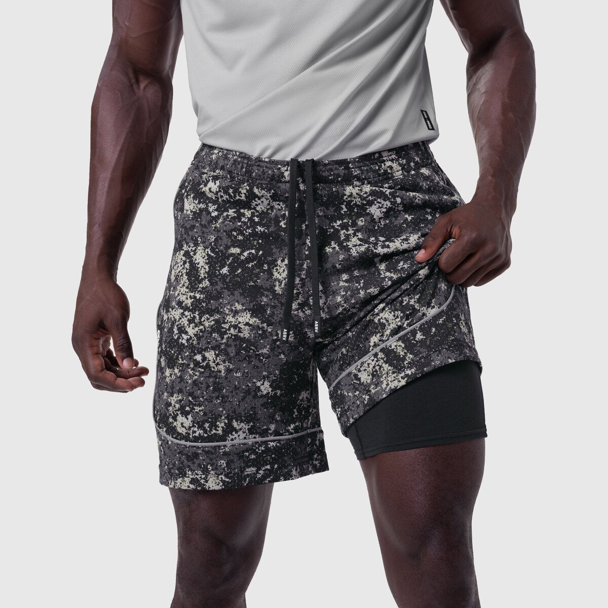 Ion-Mesh Modal Liner Short in pixel camo worn by model, front view