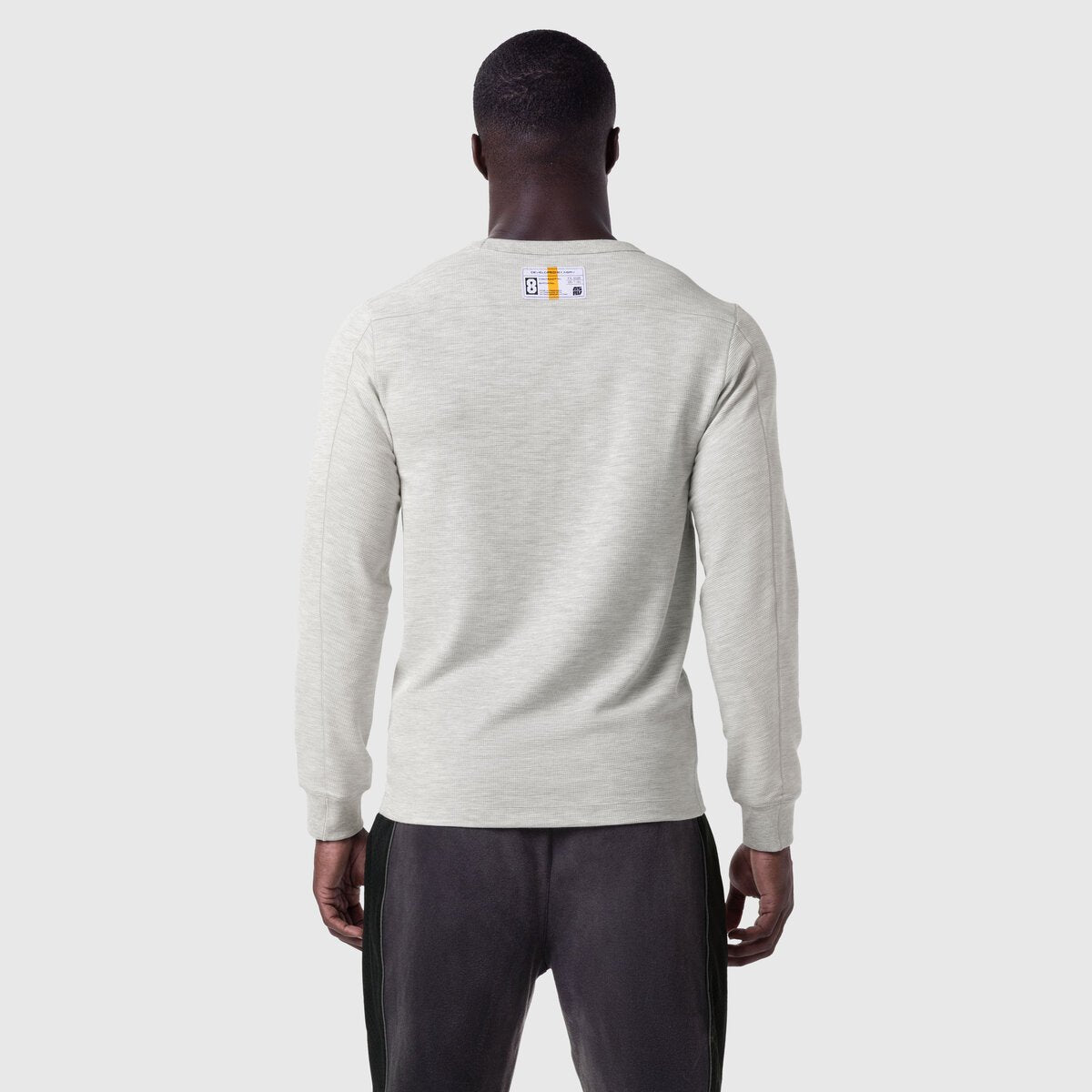 Waffle knit longsleeve in heather grey, worn by model, back view