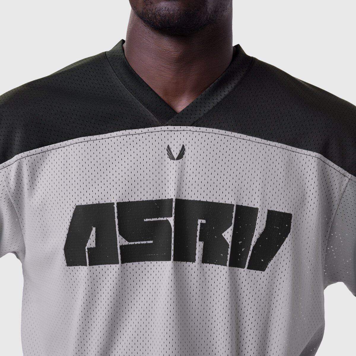 1111. Ion-Mesh™ Crop Jersey in slate grey and black, worn by model, front view