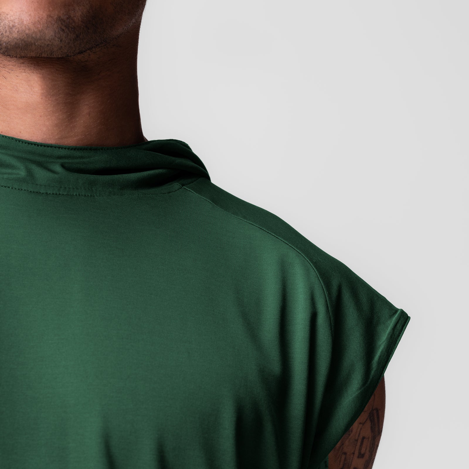 Reversible 2-in-1 Cutoff Hoodie in forest green, worn by model, back view
