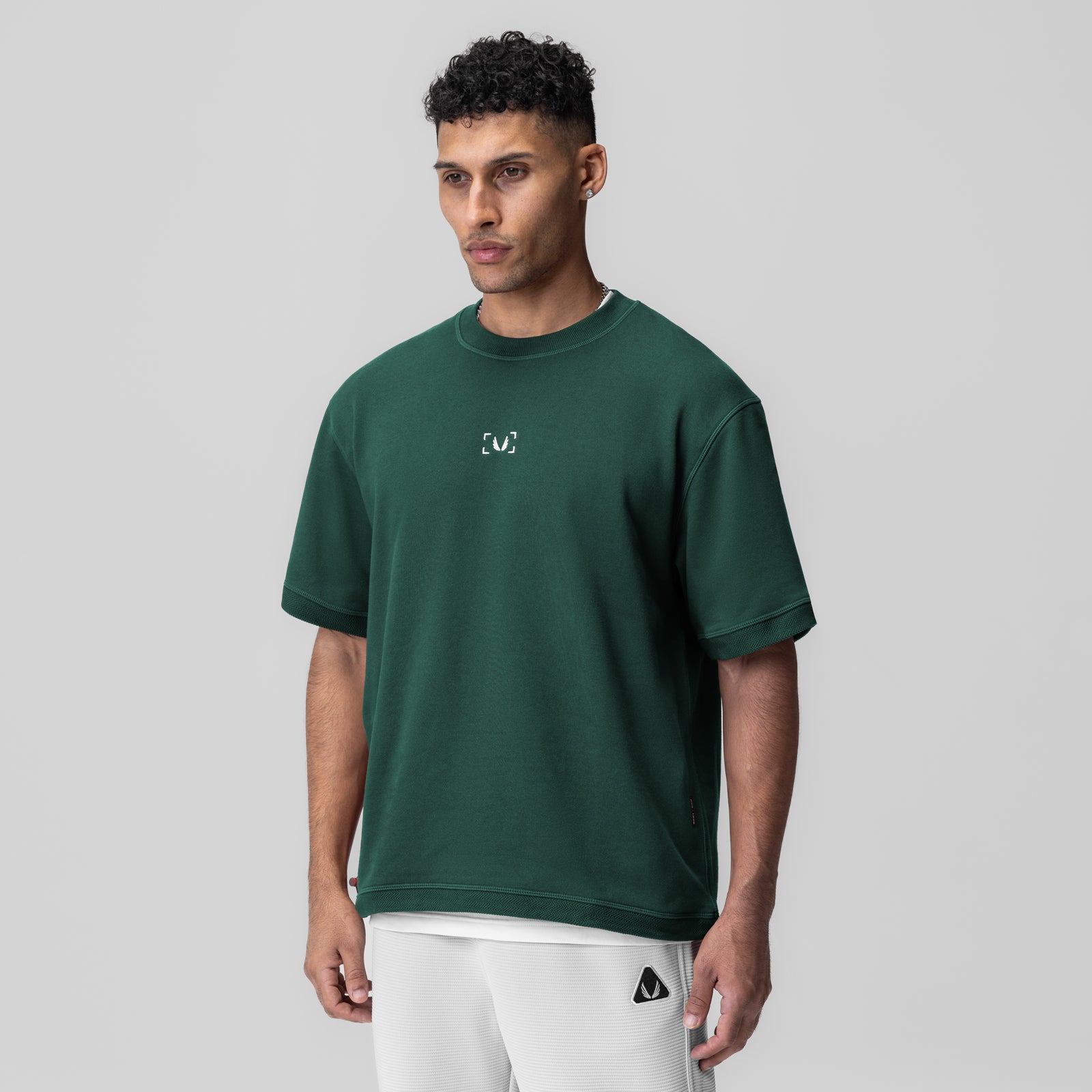 Herringbone Terry Oversized Cinch Tee in forest green, worn by model, front view