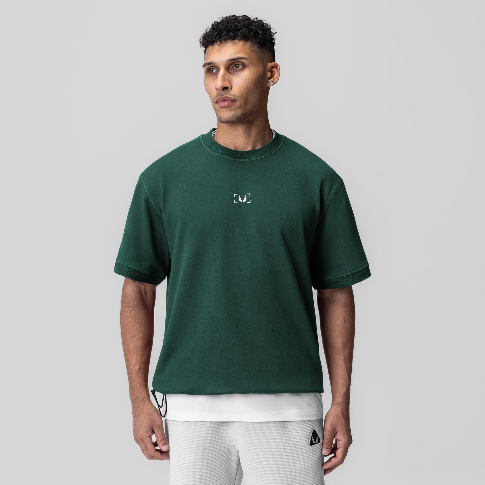 Herringbone Terry Oversized Cinch Tee in forest green, worn by model, front view
