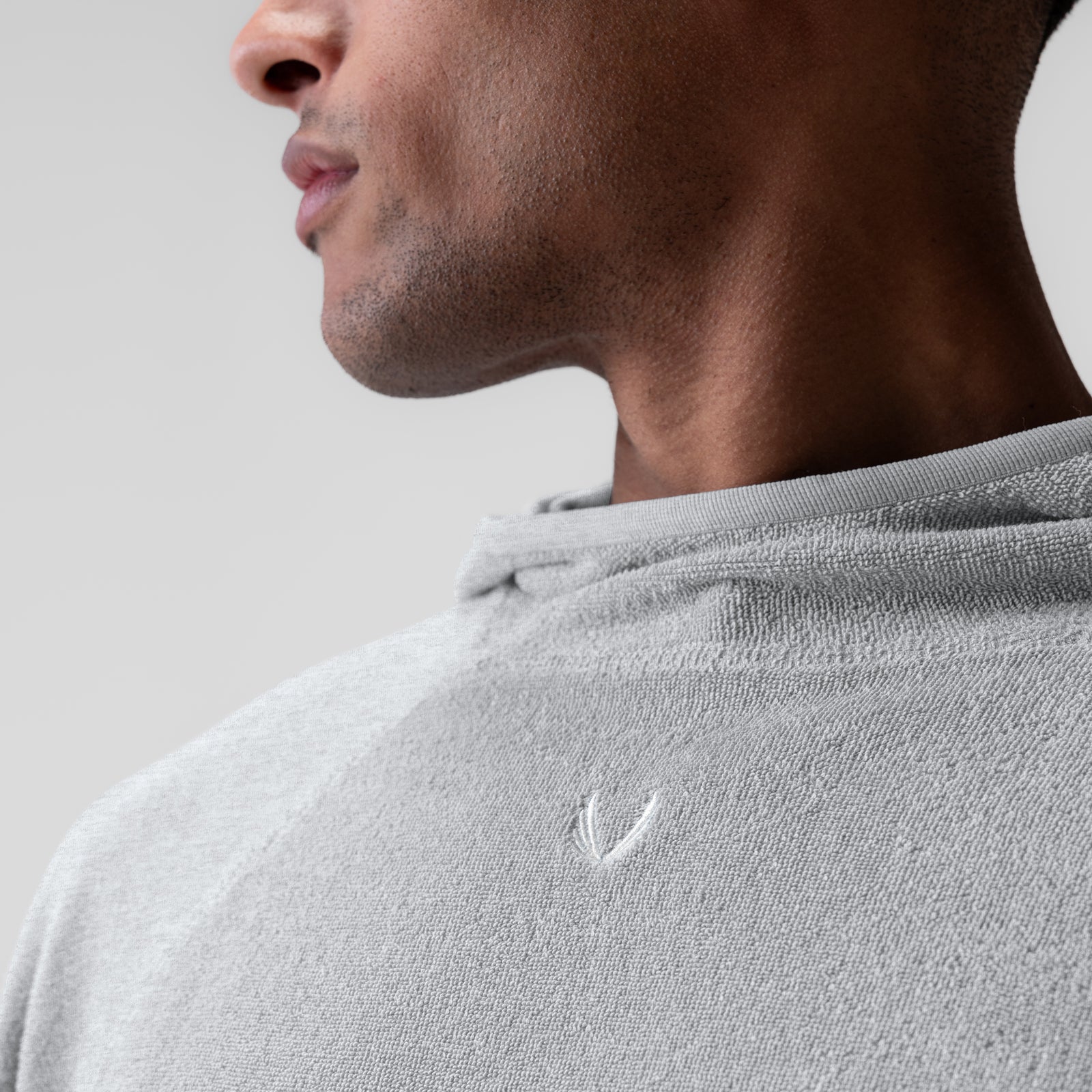 Towel Terry Reversible Hoodie in Heather Grey, side profile on model
