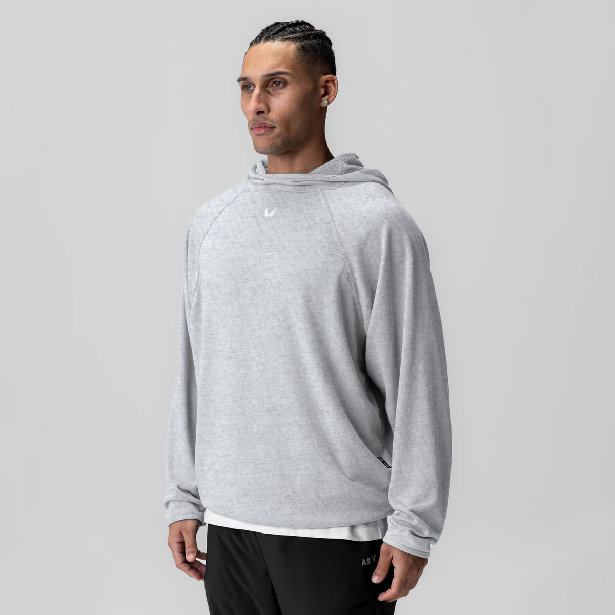 Towel Terry Reversible Hoodie in heather grey, worn by model, front three-quarter view
