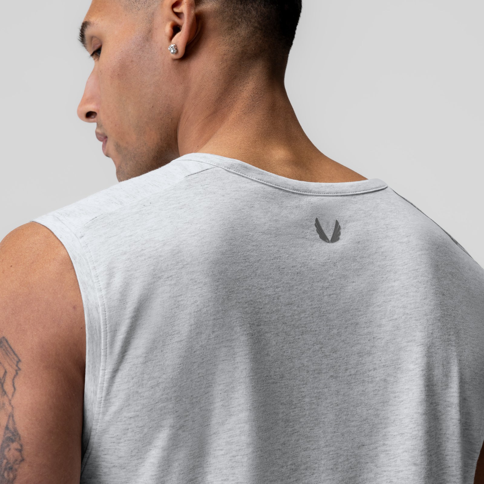 Heather grey cotton modal cutoff tank on model, back view