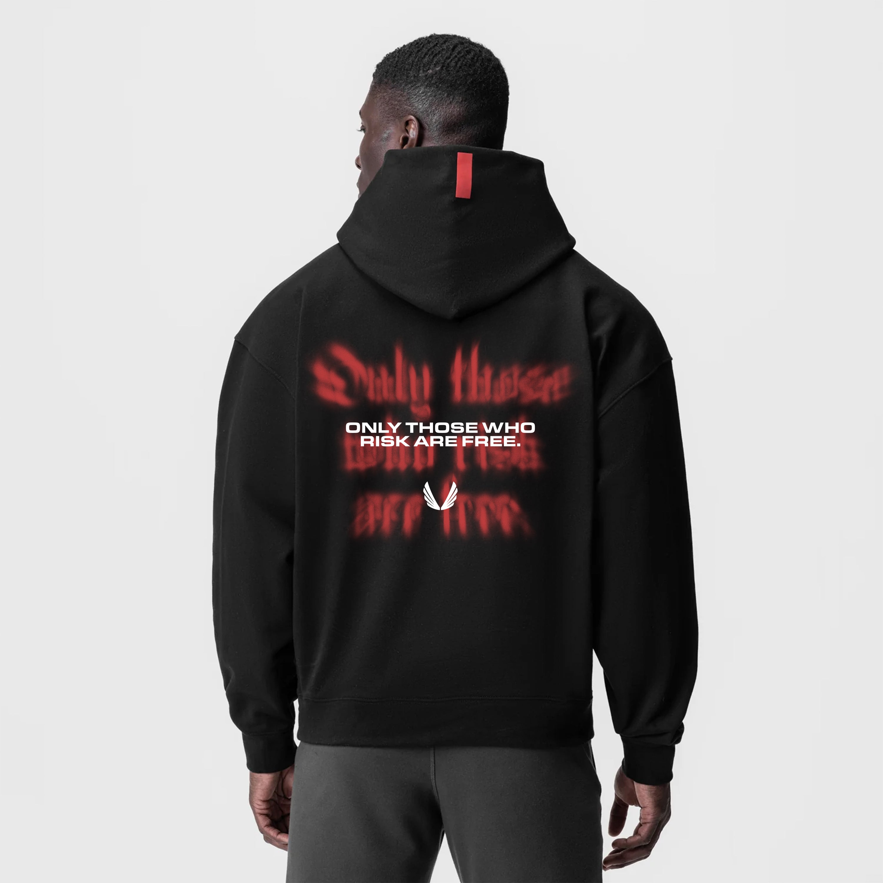 Tech-Terry™ Zip Pocket Hoodie in black with 'Risk Protocol' back graphic, worn by model, back view