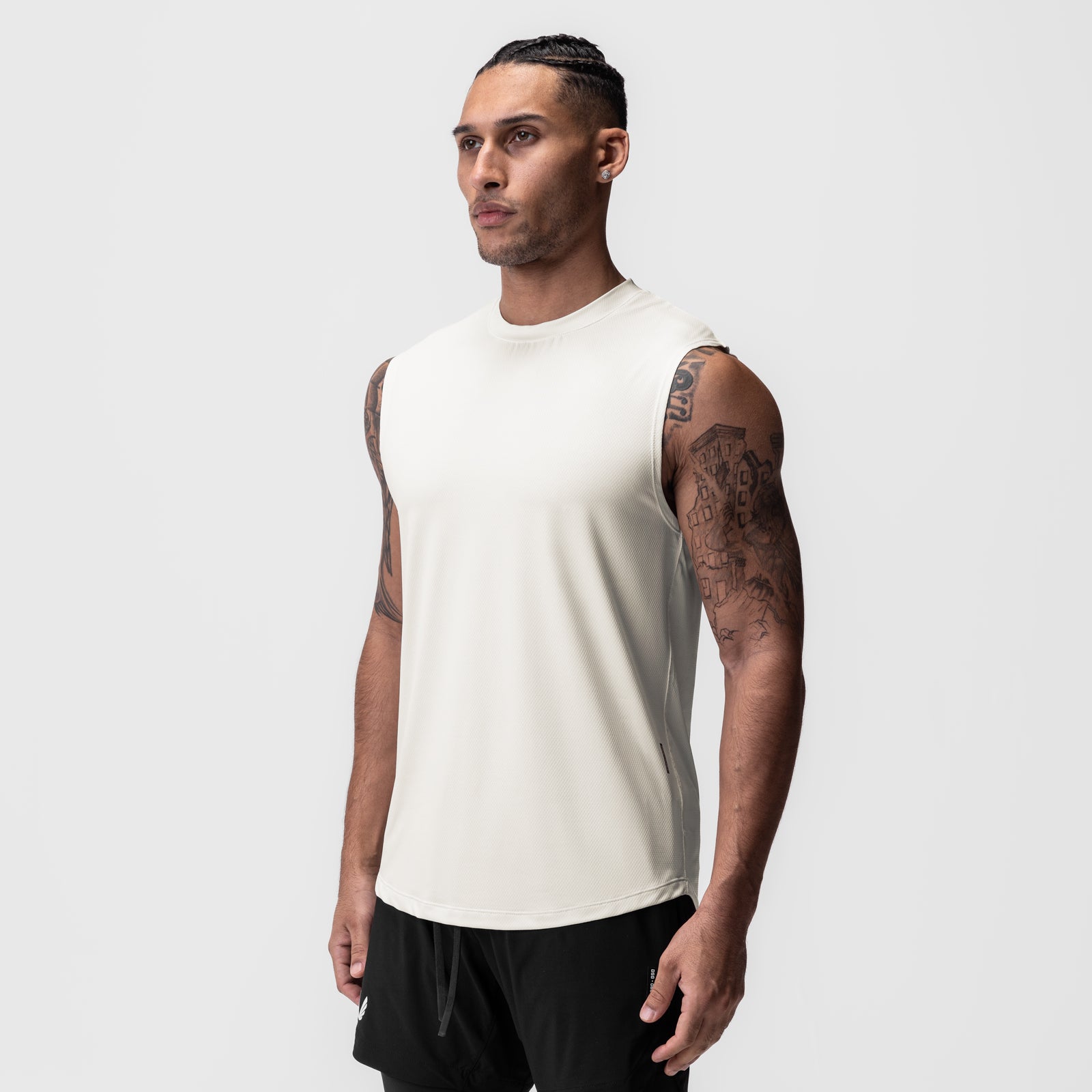 AeroSilver® Cutoff Tank in ivory cream, worn by model, front view