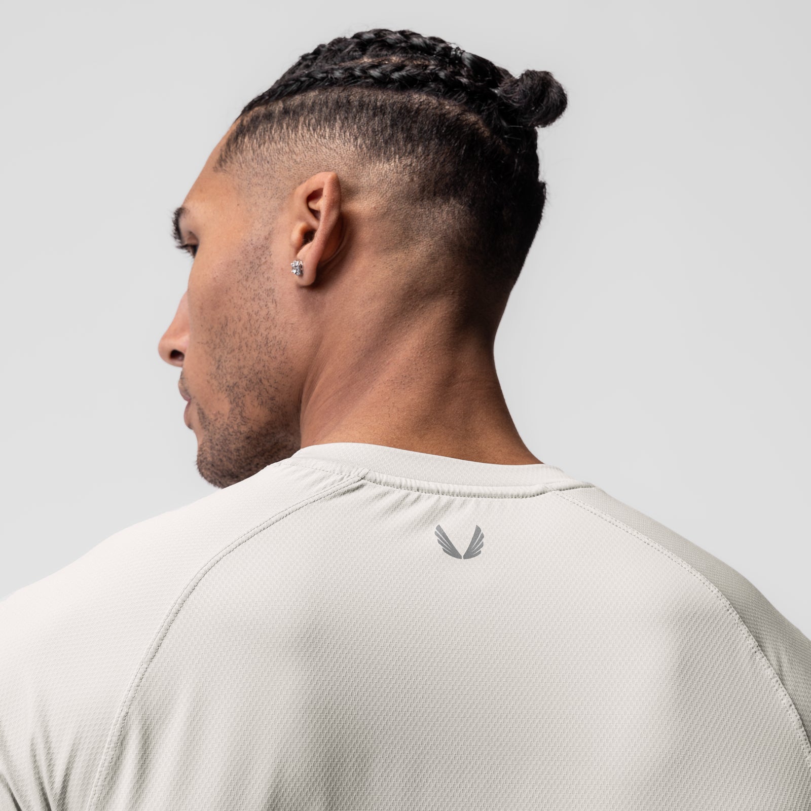 AeroSilver® Established Tee in ivory cream, back view on model