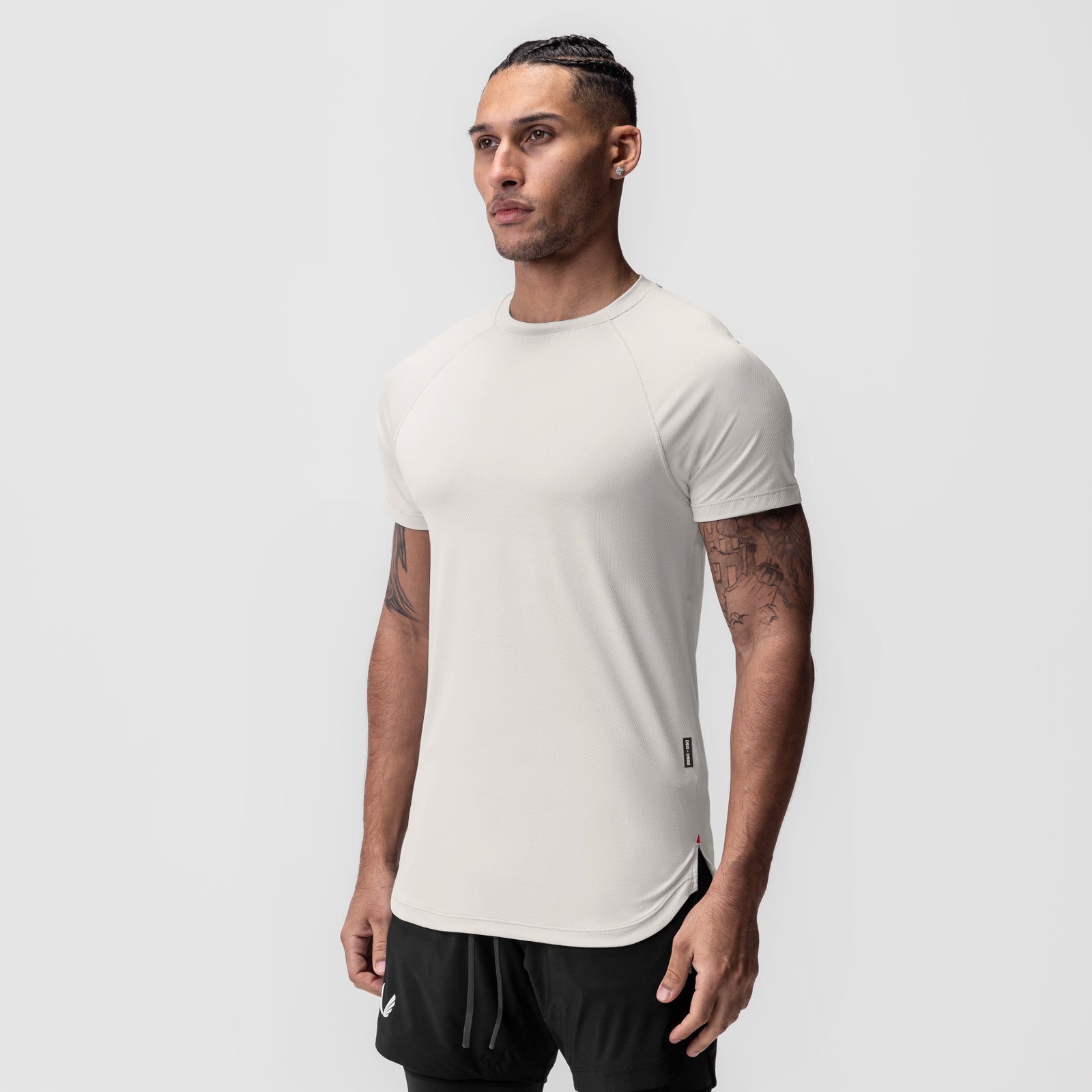 AeroSilver Established Tee in ivory cream, worn by model in front view