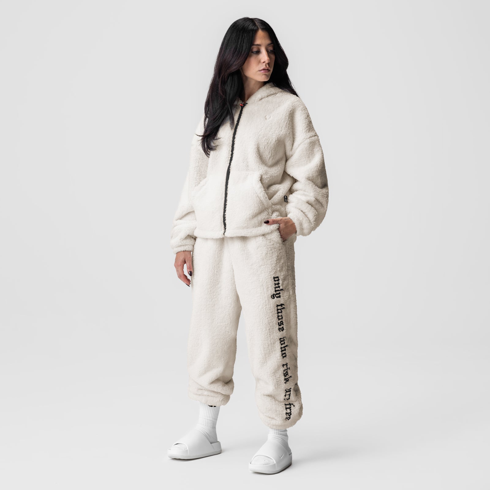 Womens Sherpa Recovery Sweats in ivory cream with black text, full outfit on model