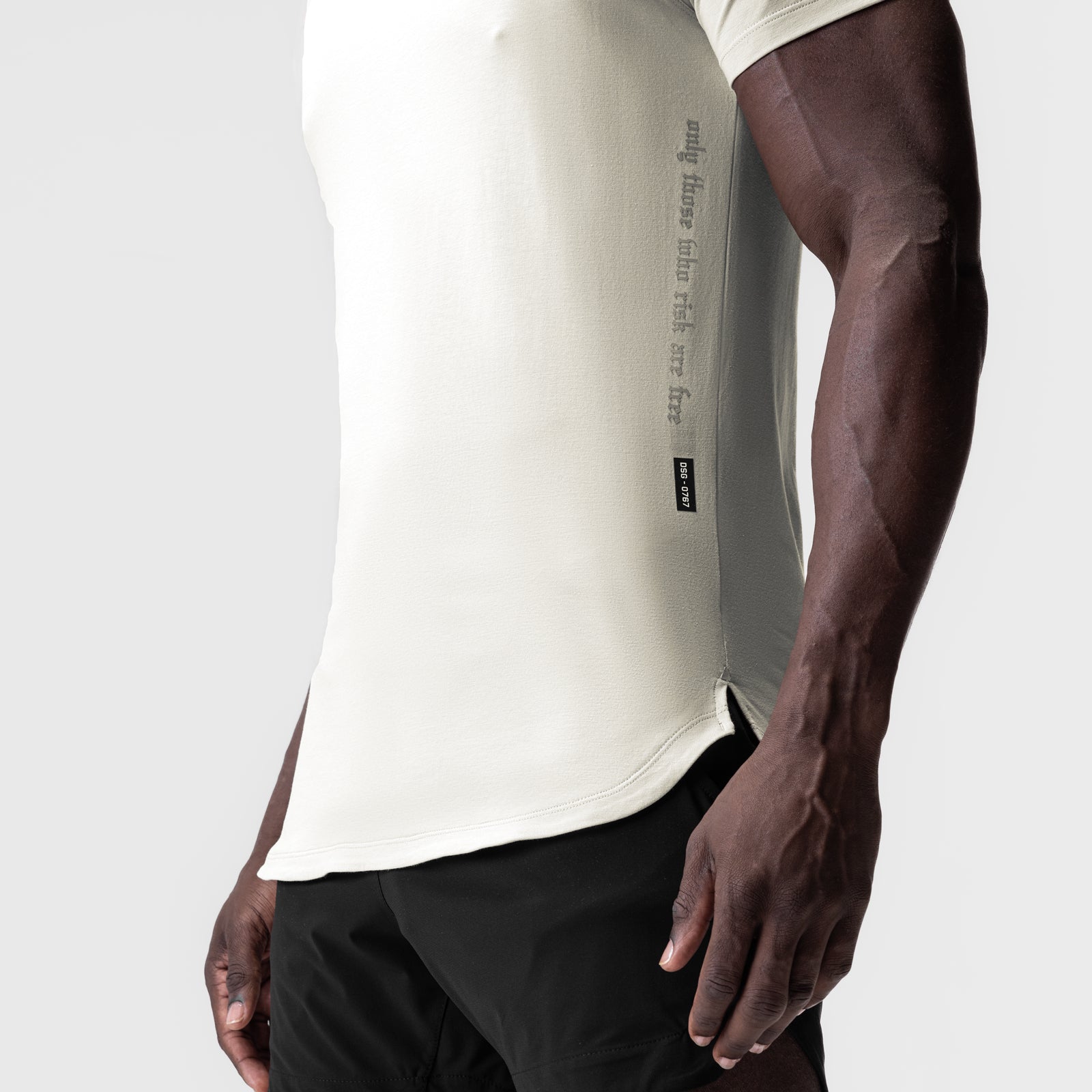 Supima® Established Tee in ivory cream worn by model, side view