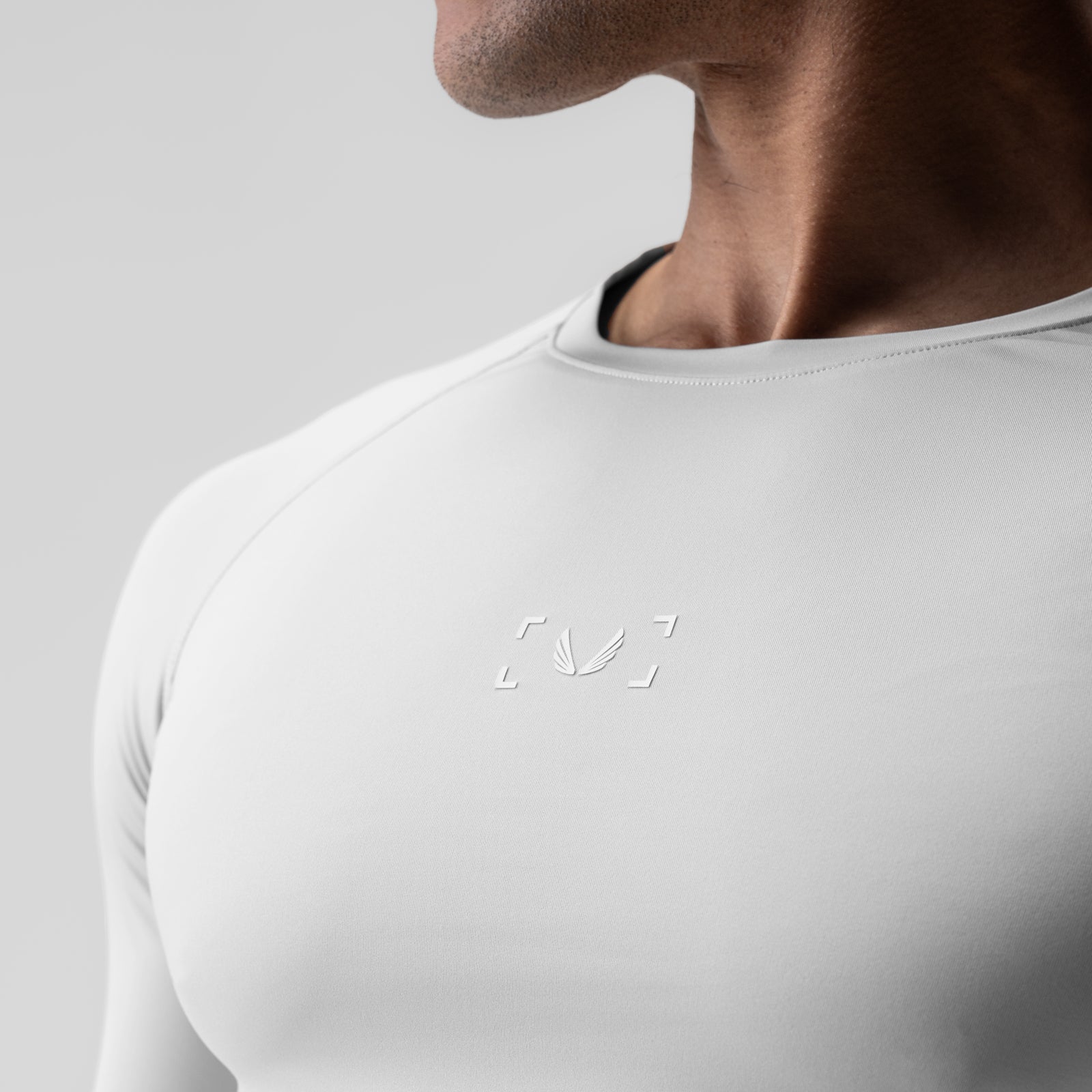 WarpFlexx-Lite Half-Sleeve Baselayer in white, worn by model, front view
