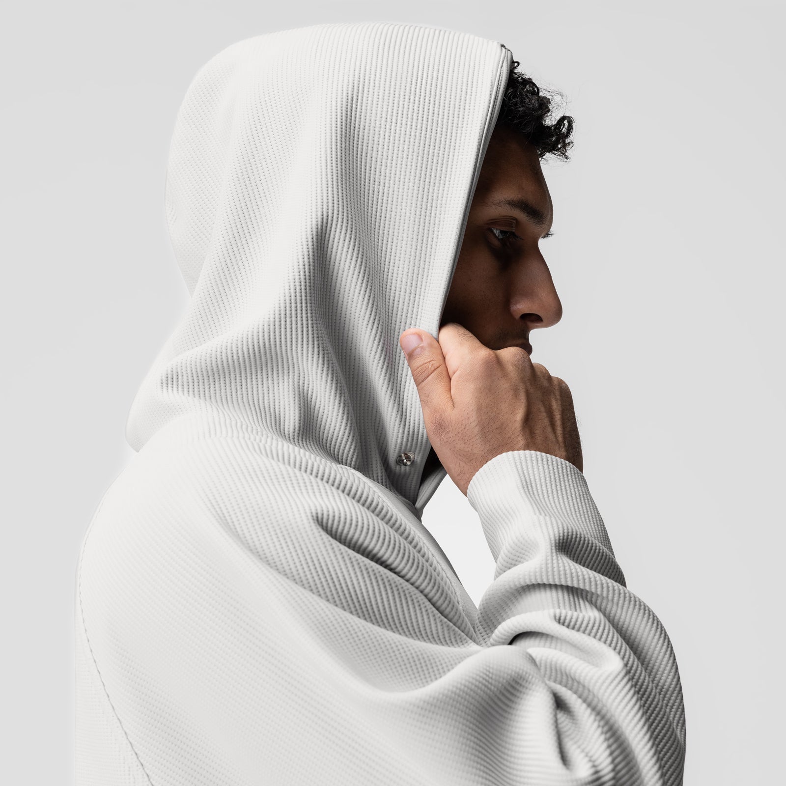 Deltapeak® Oversized Hoodie in light grey, worn by model in profile view with hood up