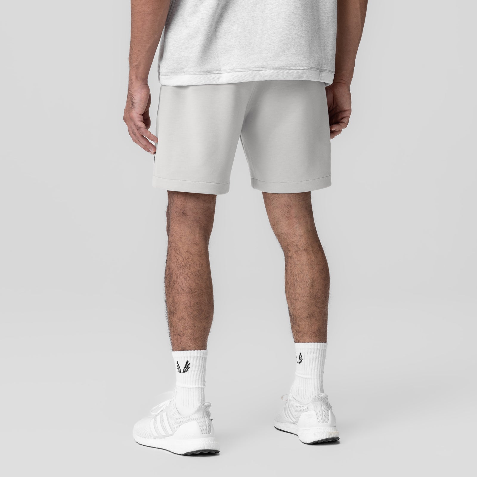 Dri-Core Training Short in light grey, rear view on model with white socks