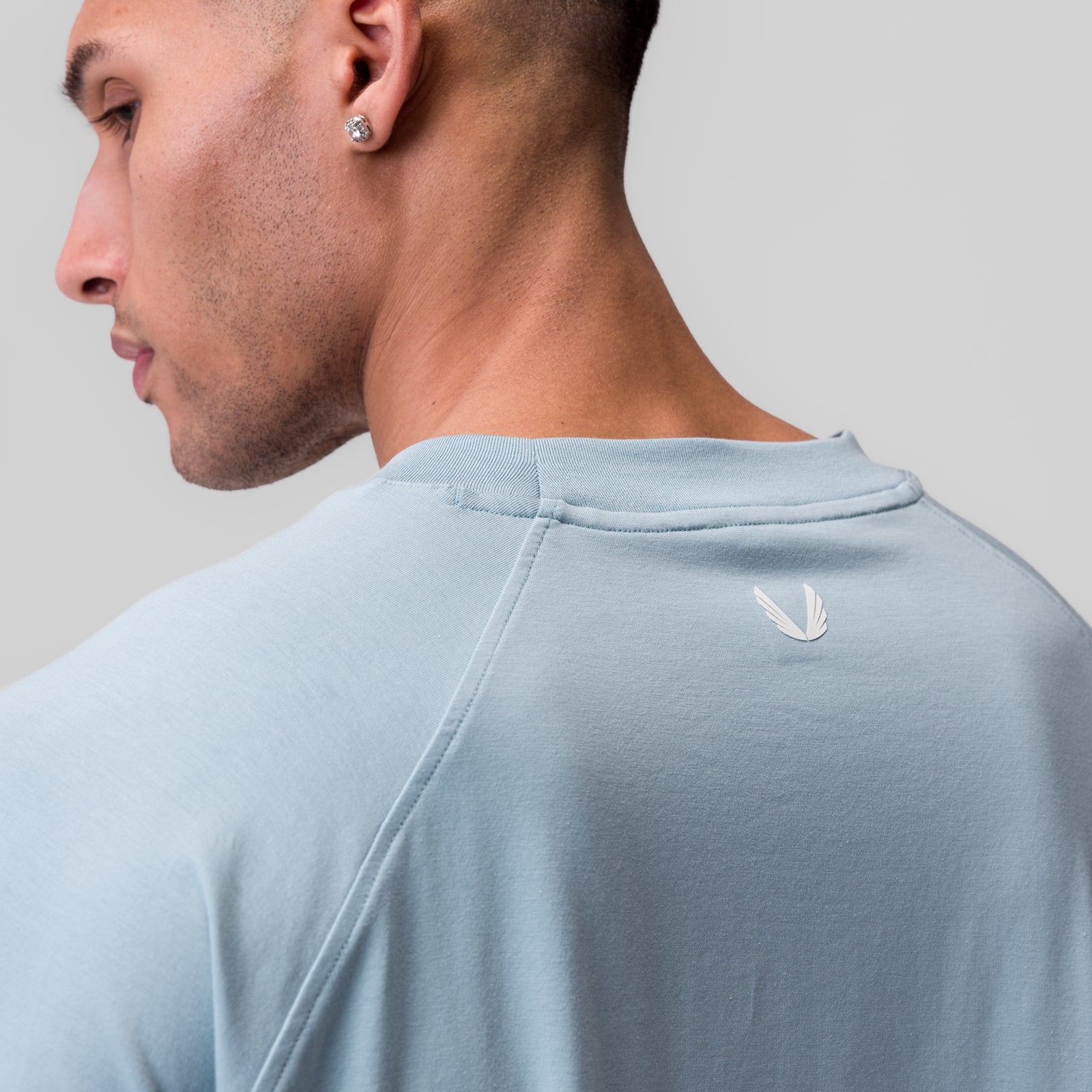 Supima® 3/4-sleeve oversized tee in light sky, worn by model shown from side profile