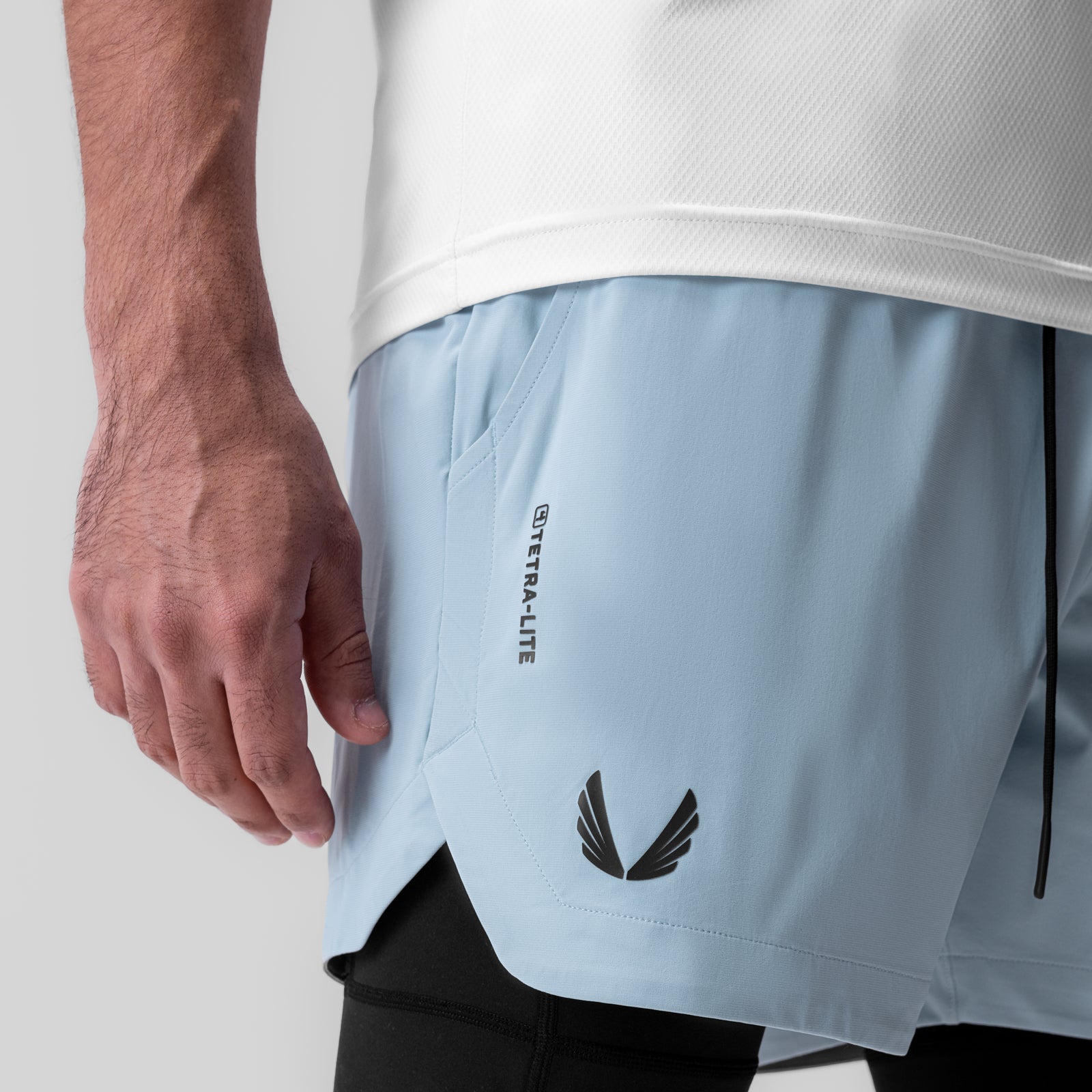 Tetra-Lite 5" Liner Short in Light Sky with Wings logo, worn by model, side view
