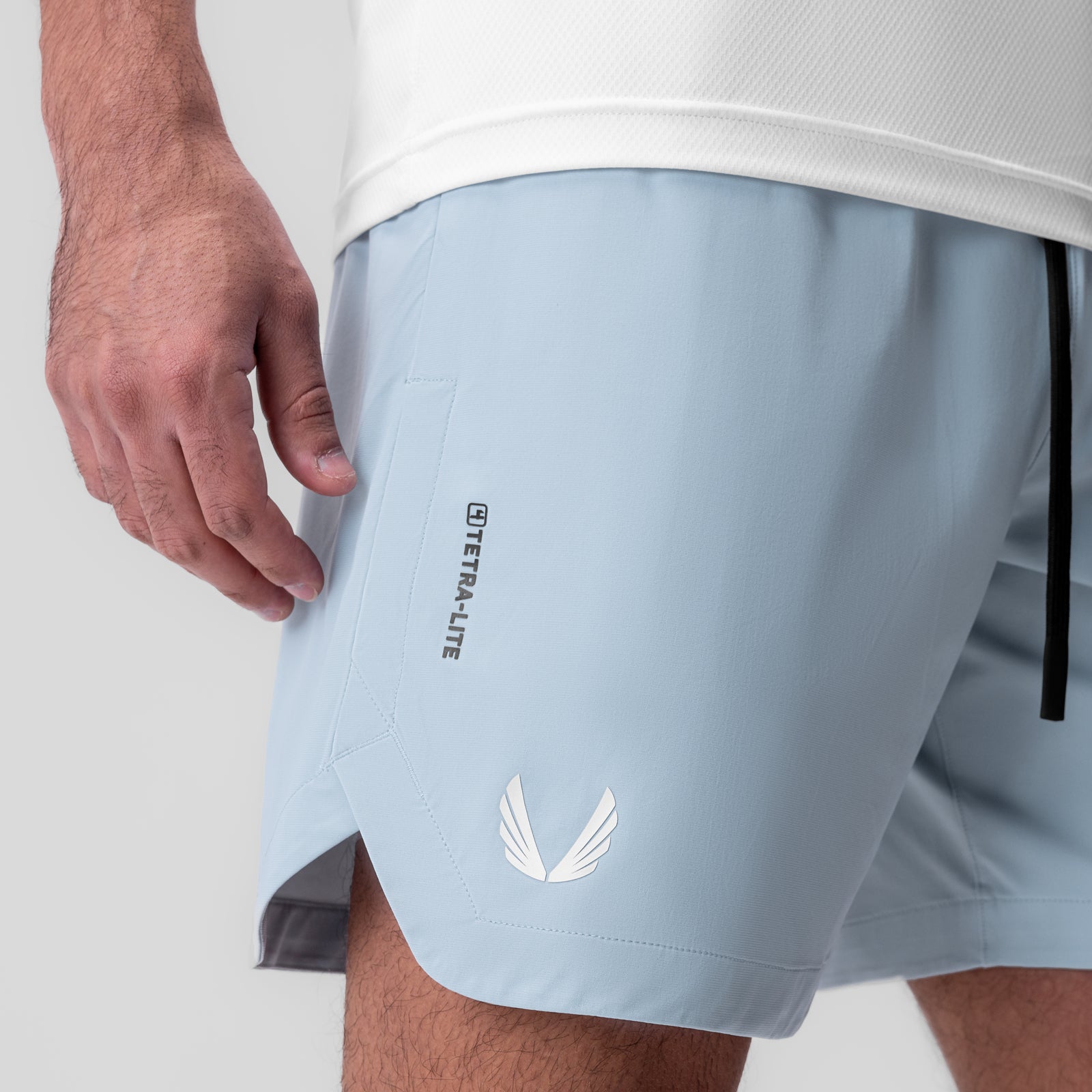 Tetra-Lite 7" Linerless Short in Light Sky, worn by model, side view