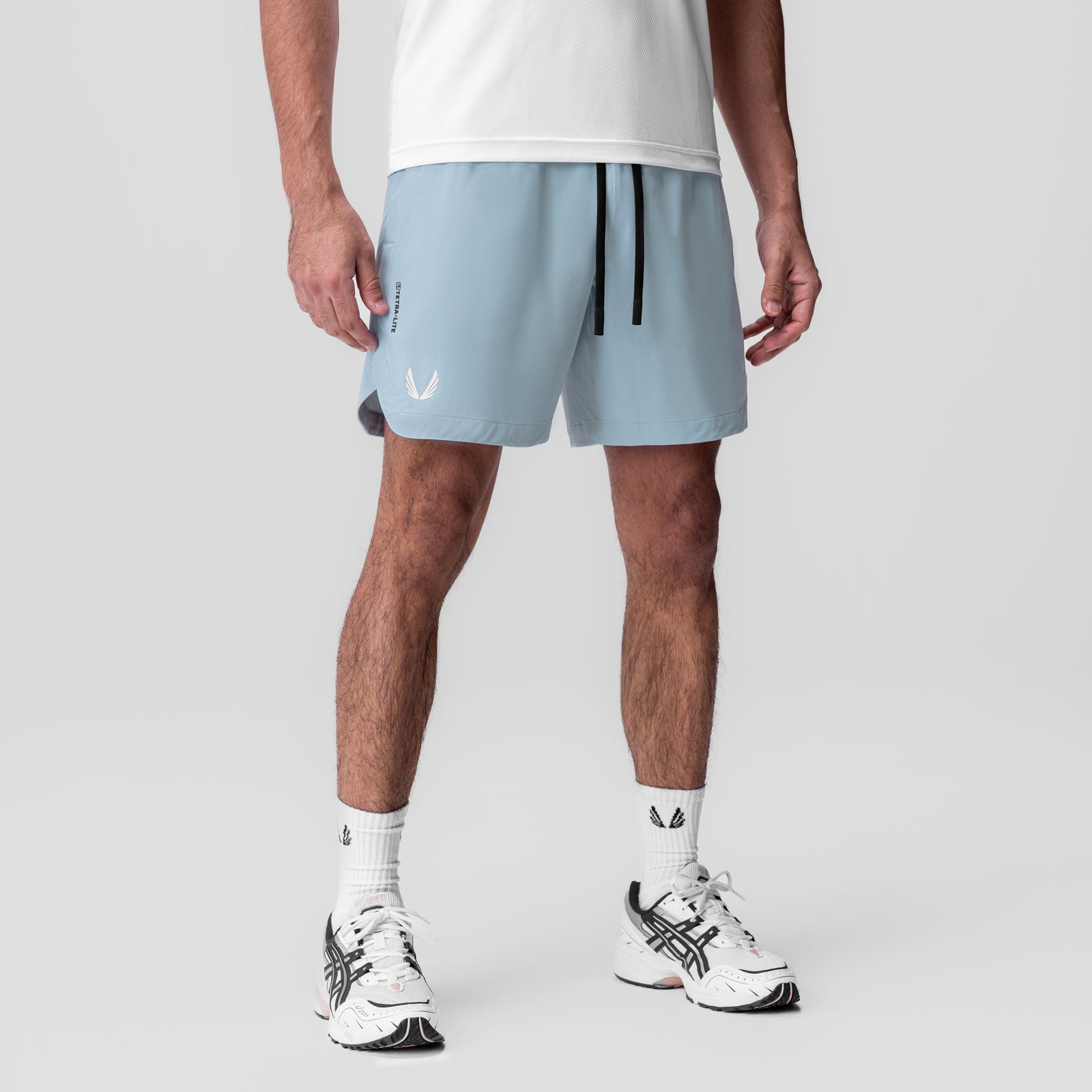 Tetra-Lite 7" Linerless Short in light sky blue, worn by model, front view