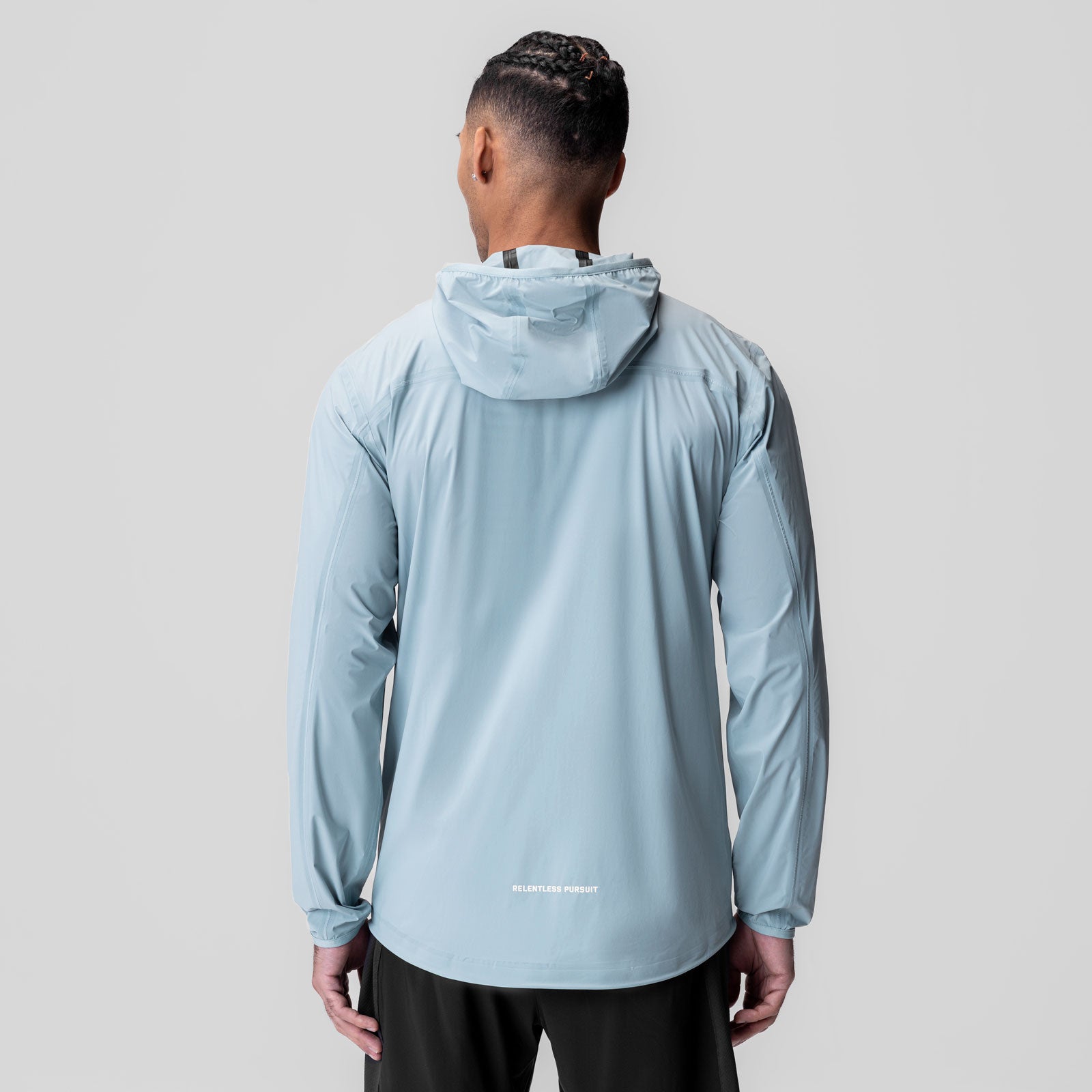 Aerotex Lightweight Windbreaker in light sky, back view on model