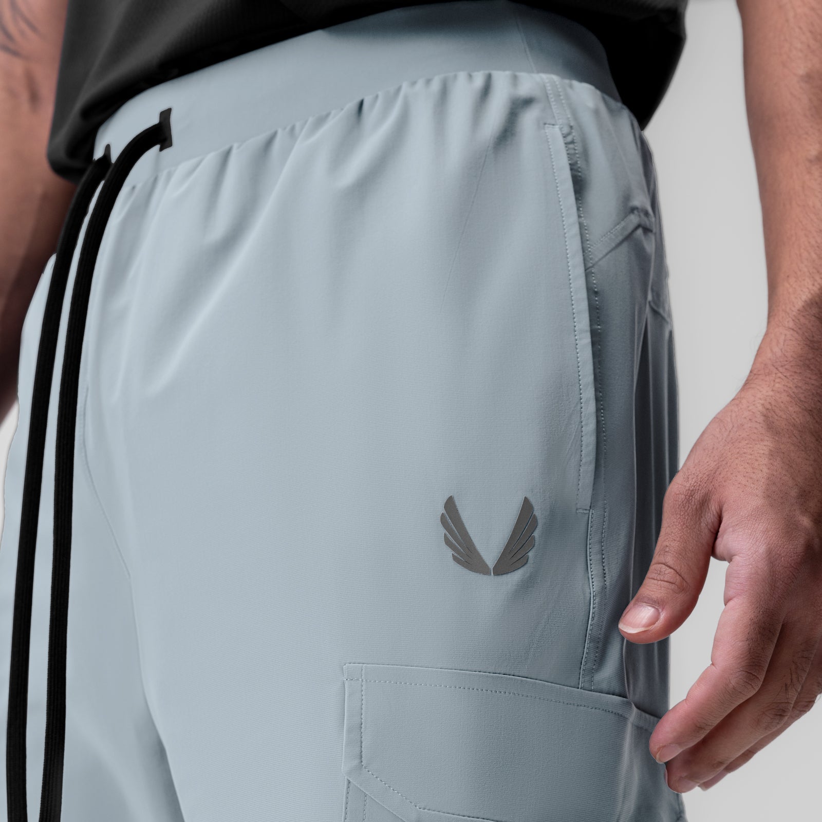 Light Sky Tetra-Lite Ice Cargo High Rib Jogger worn by model, side view detail