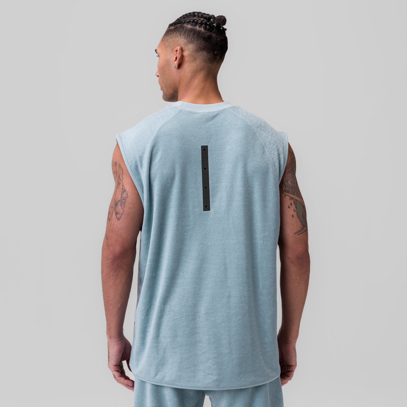 Towel Terry Cutoff sleeveless tank in light sky, back view on model